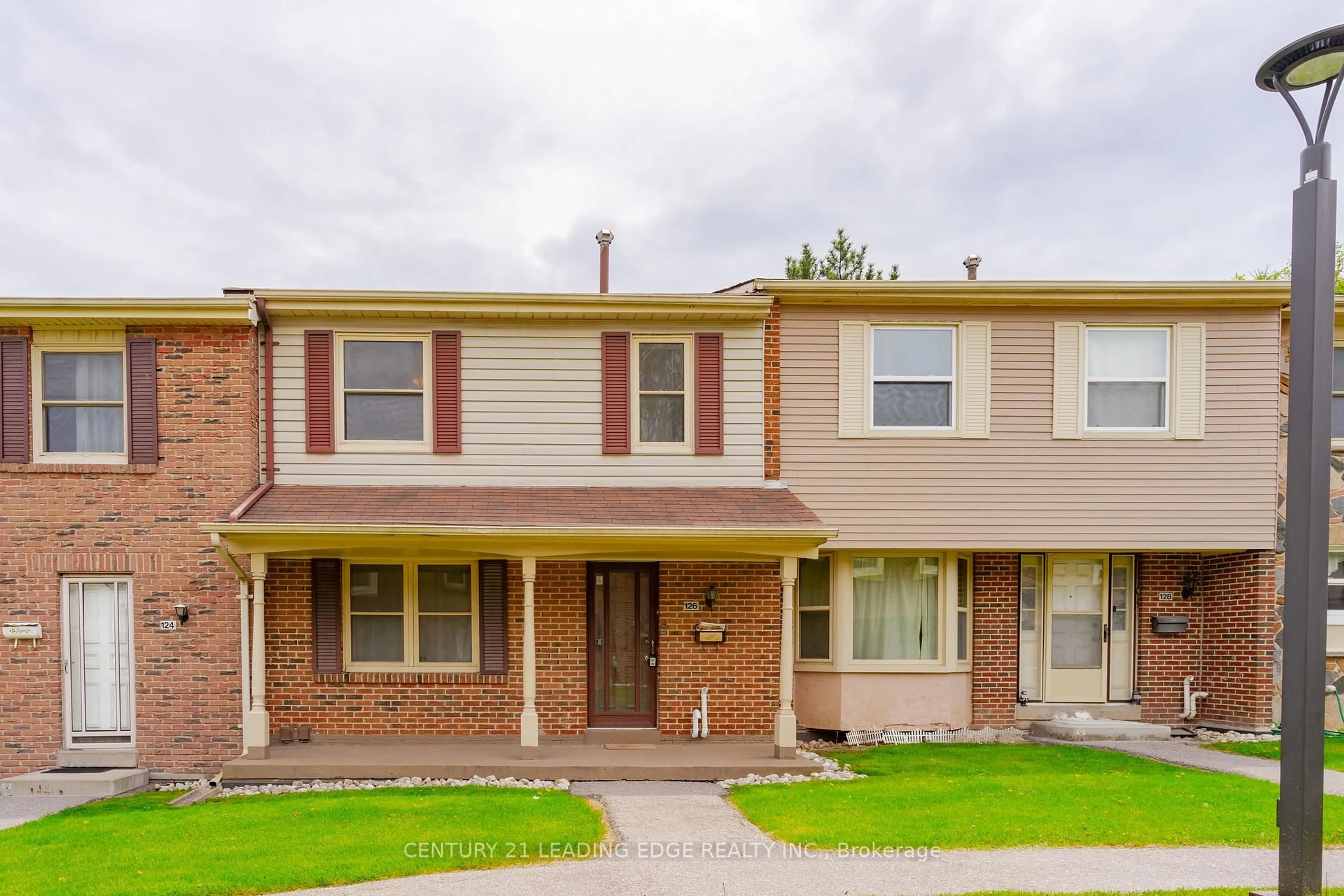 Home with brick exterior material, street for 91 L'Amoreaux Dr #126, Toronto Ontario M1W 2J8
