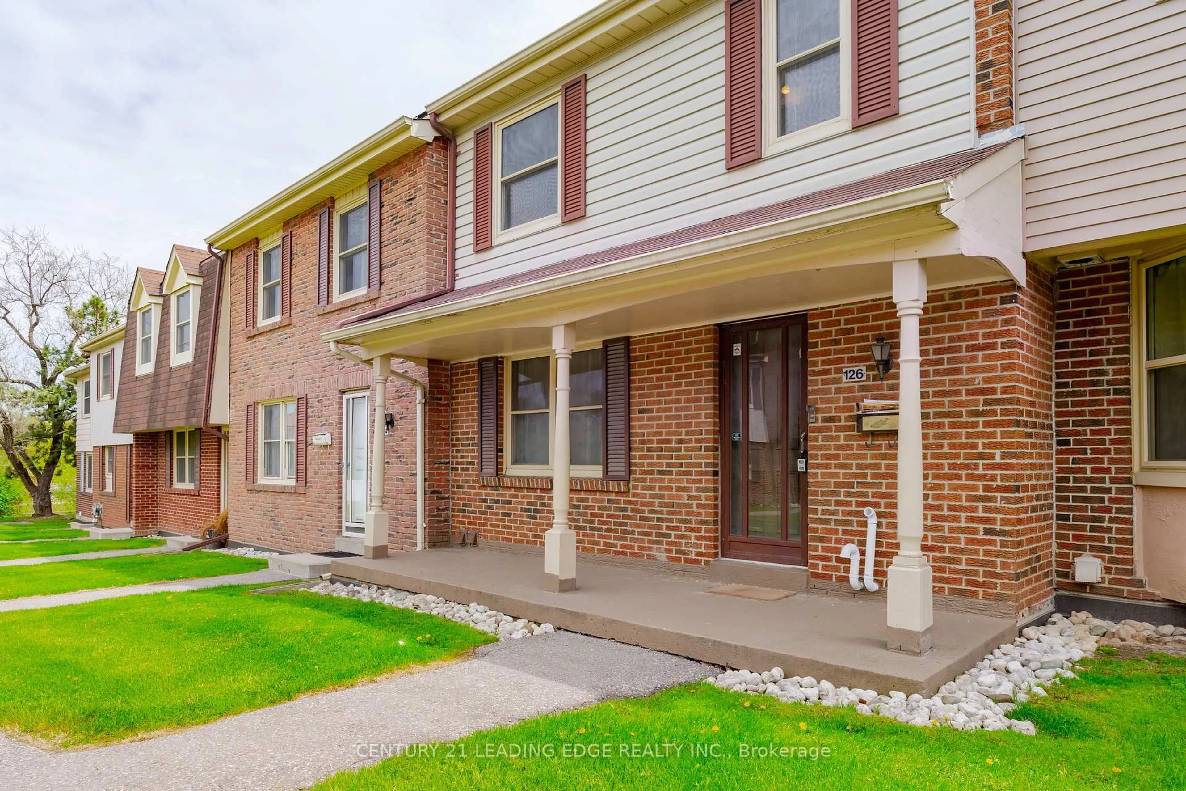 Home with brick exterior material, street for 91 L'Amoreaux Dr #126, Toronto Ontario M1W 2J8