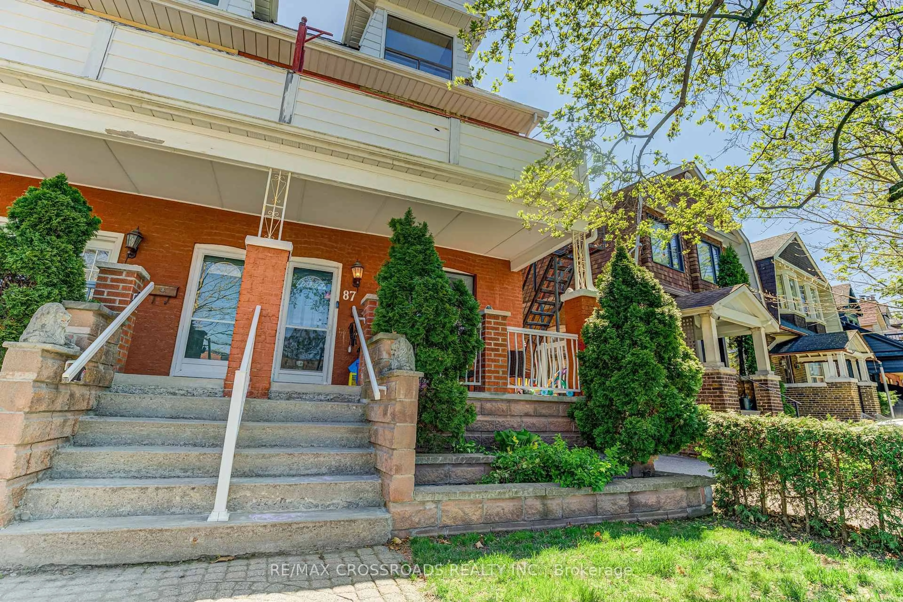 Home with brick exterior material, street for 87 Wembley Dr, Toronto Ontario M4L 3C9