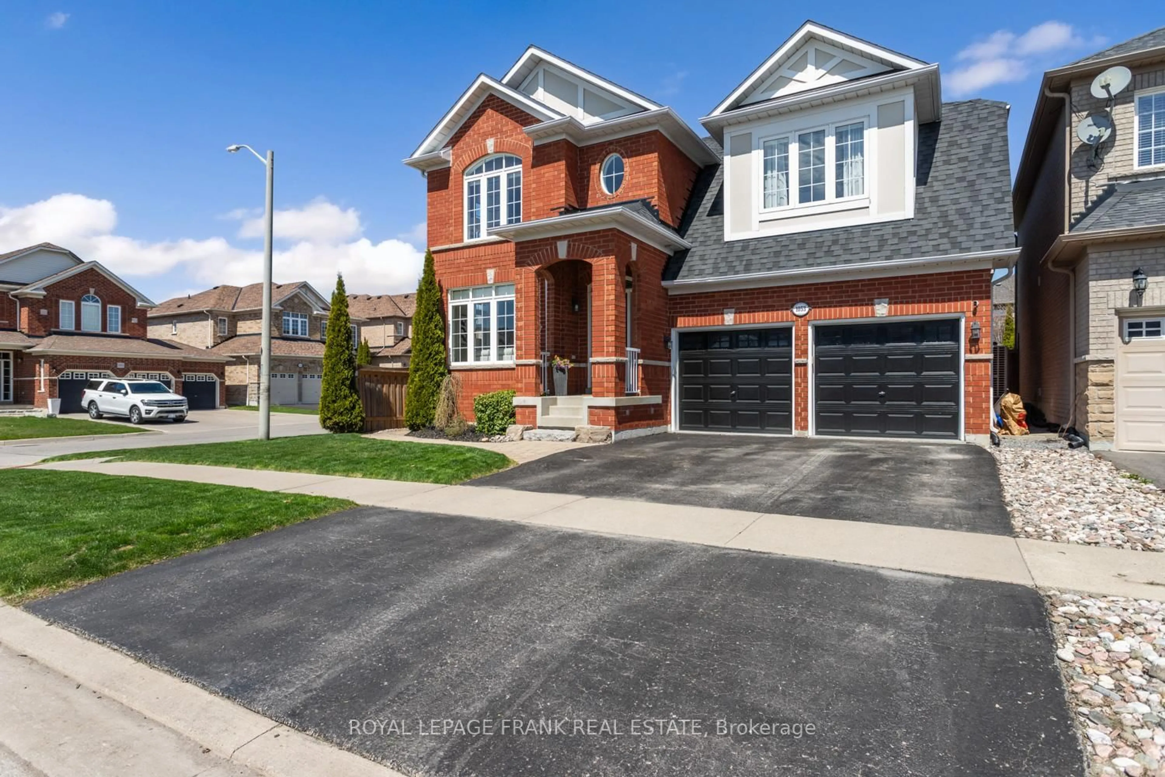 Home with brick exterior material, street for 1053 Copperfield Dr, Oshawa Ontario L1K 3C4