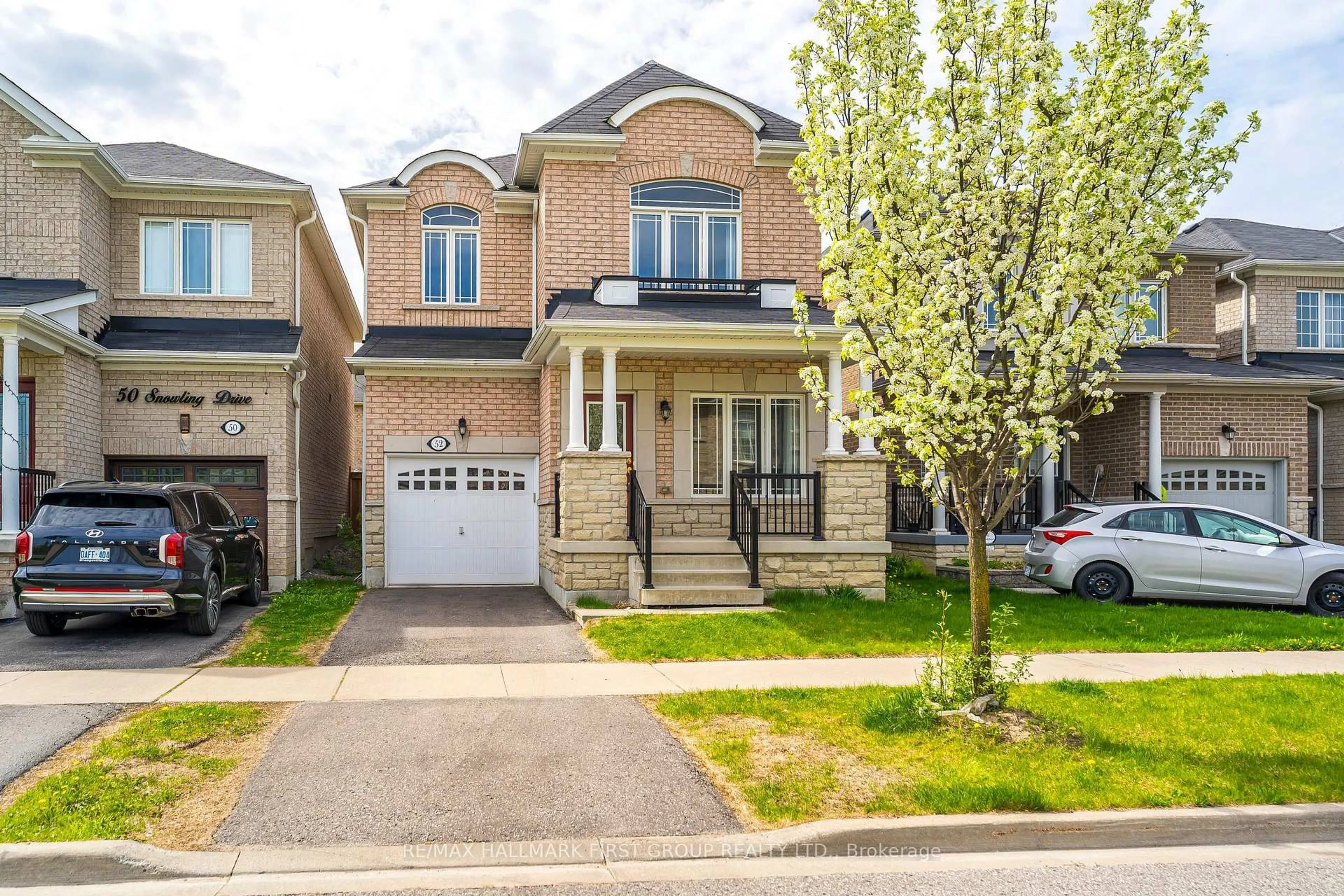 Home with brick exterior material, street for 52 Snowling Dr, Ajax Ontario L1Z 0M4