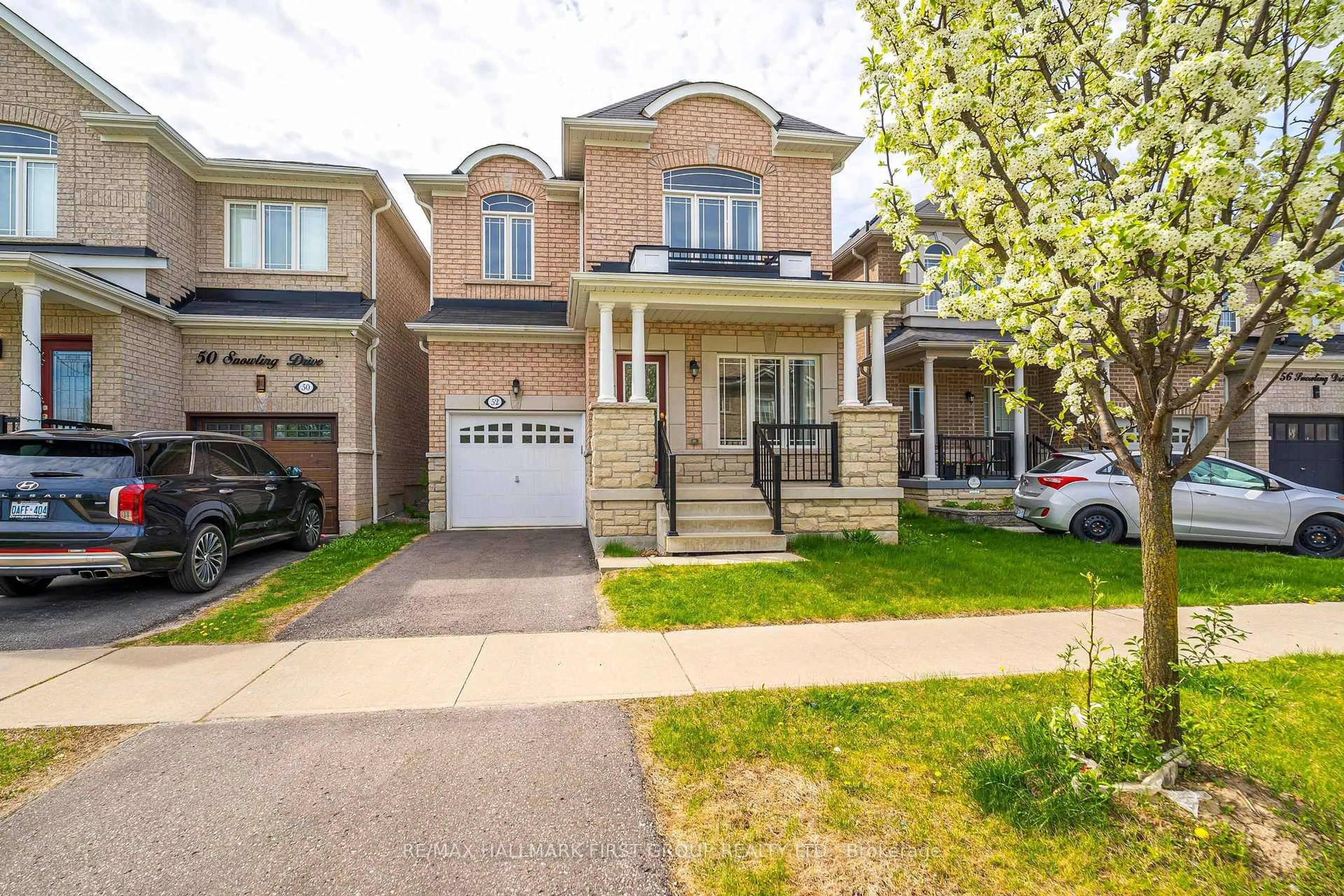 Home with brick exterior material, street for 52 Snowling Dr, Ajax Ontario L1Z 0M4