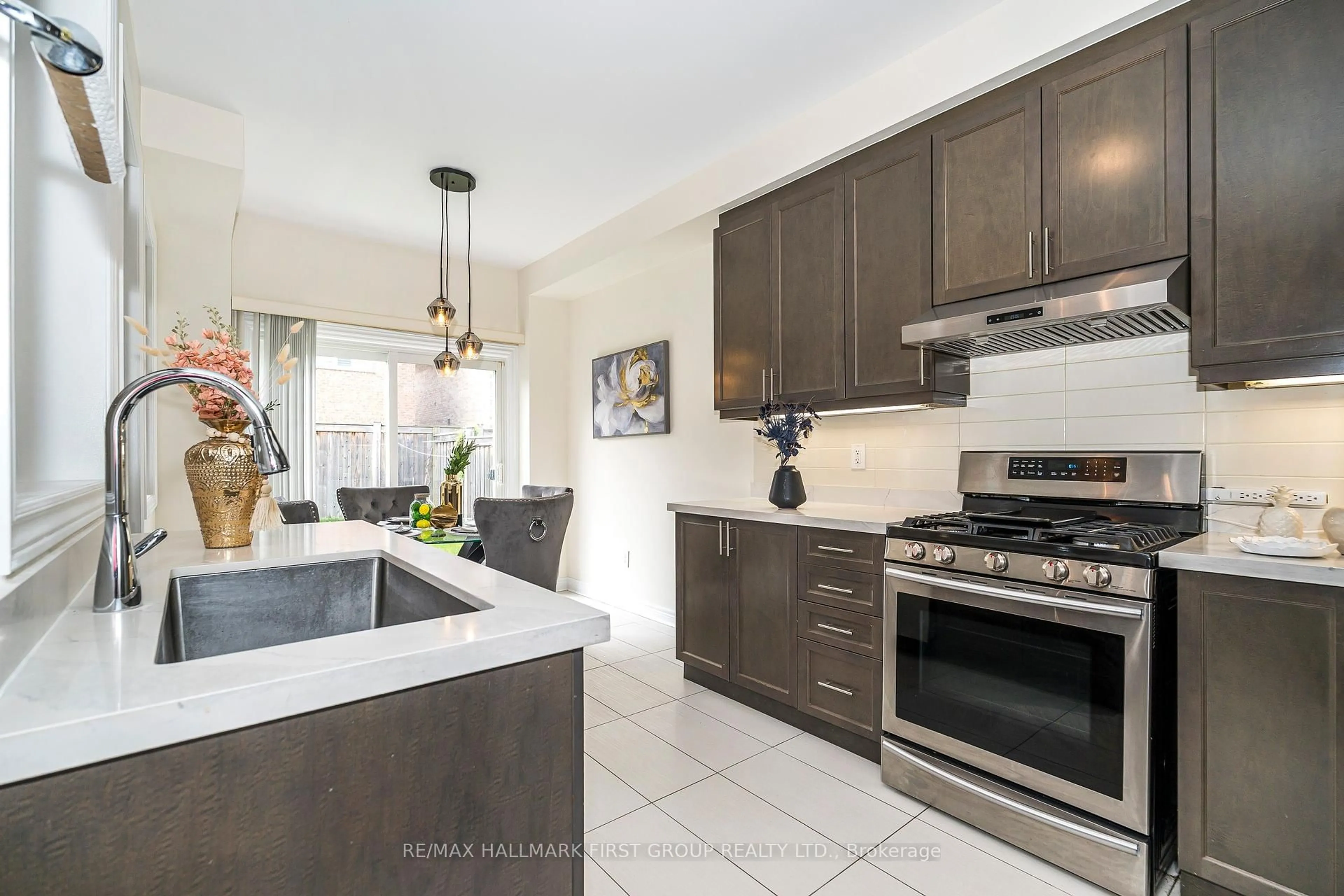 Open concept kitchen, ceramic/tile floor for 52 Snowling Dr, Ajax Ontario L1Z 0M4