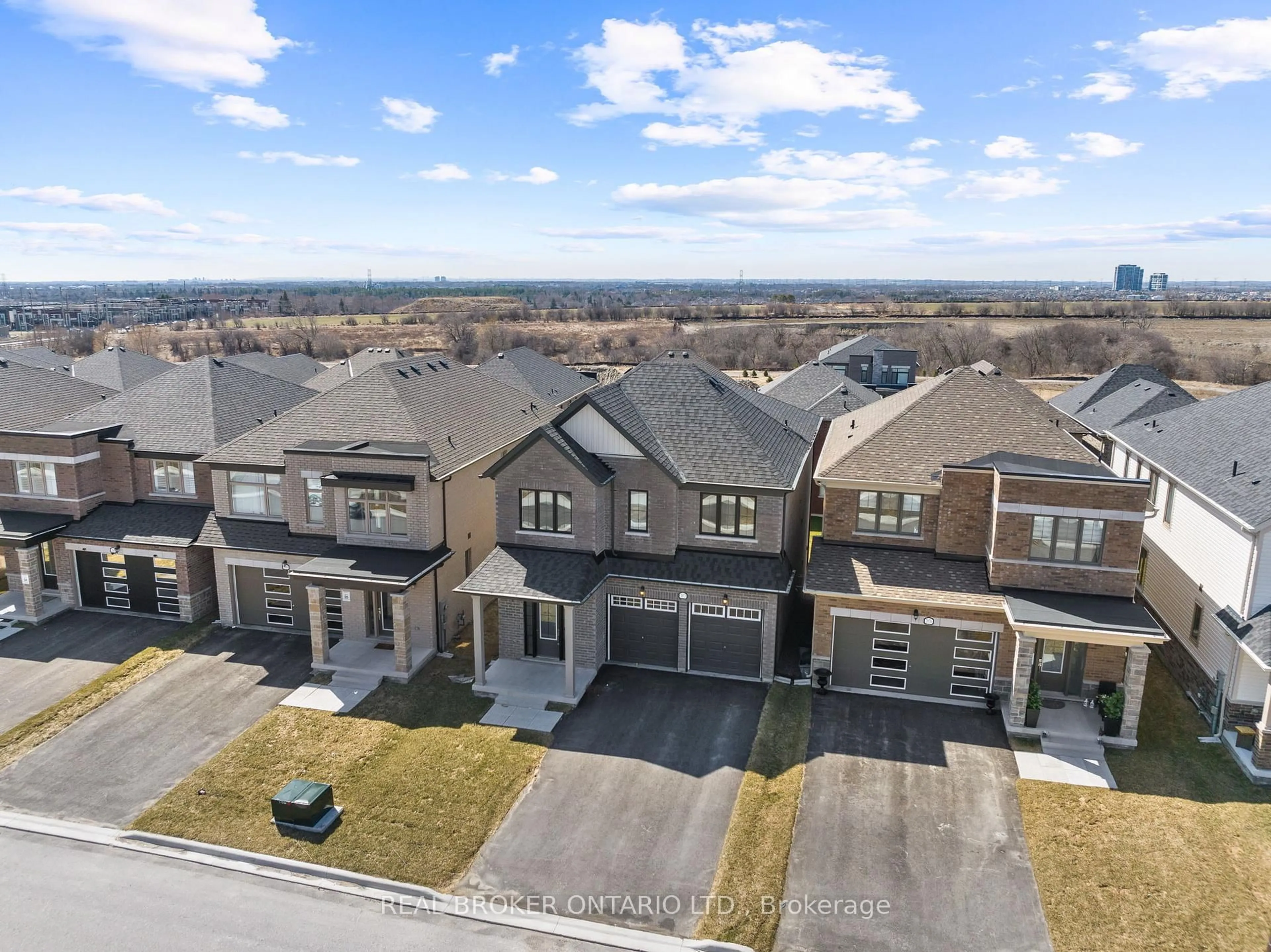 A pic from outside/outdoor area/front of a property/back of a property/a pic from drone, street for 2072 Chris Mason St, Oshawa Ontario L1L 0S6