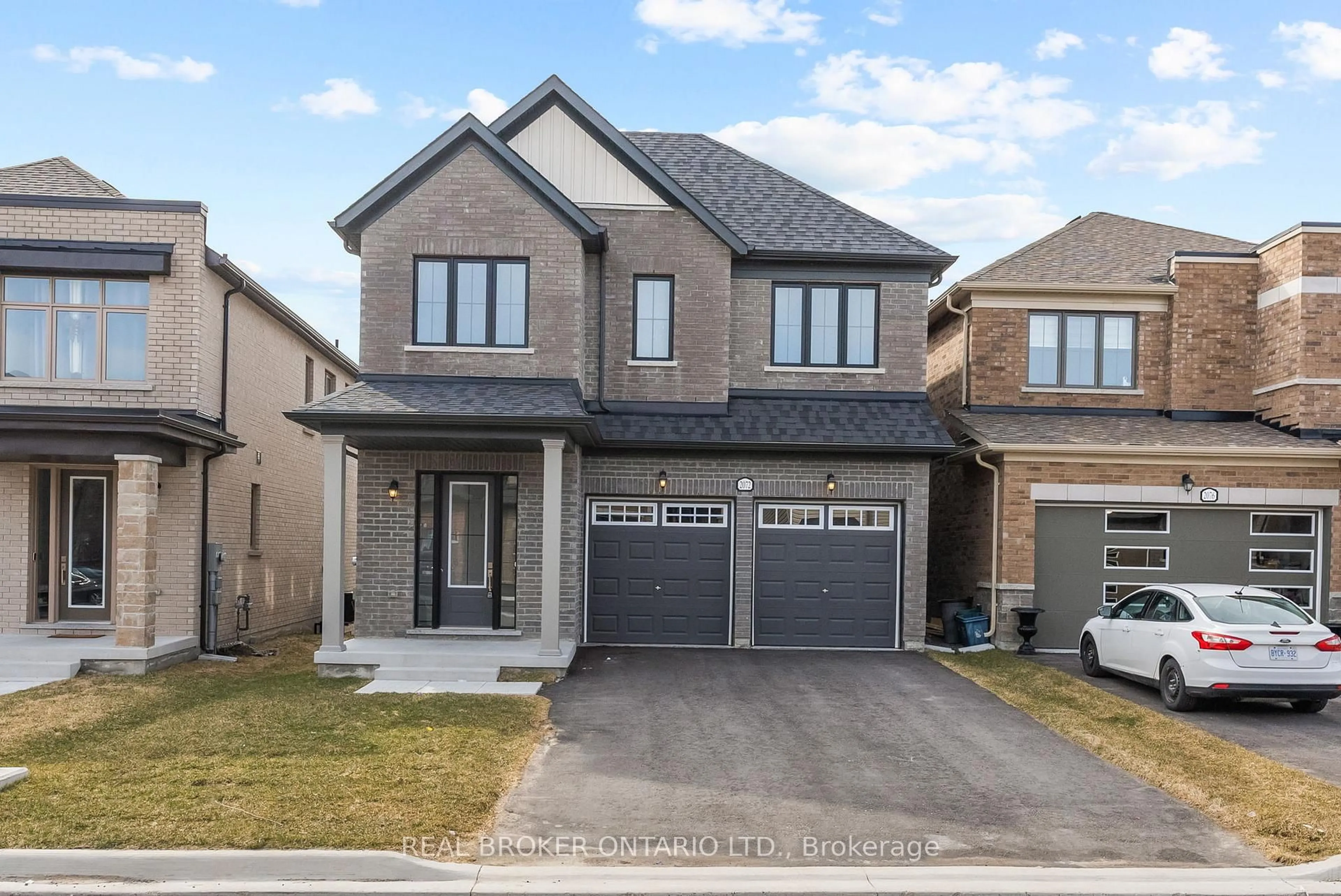 Home with brick exterior material, street for 2072 Chris Mason St, Oshawa Ontario L1L 0S6