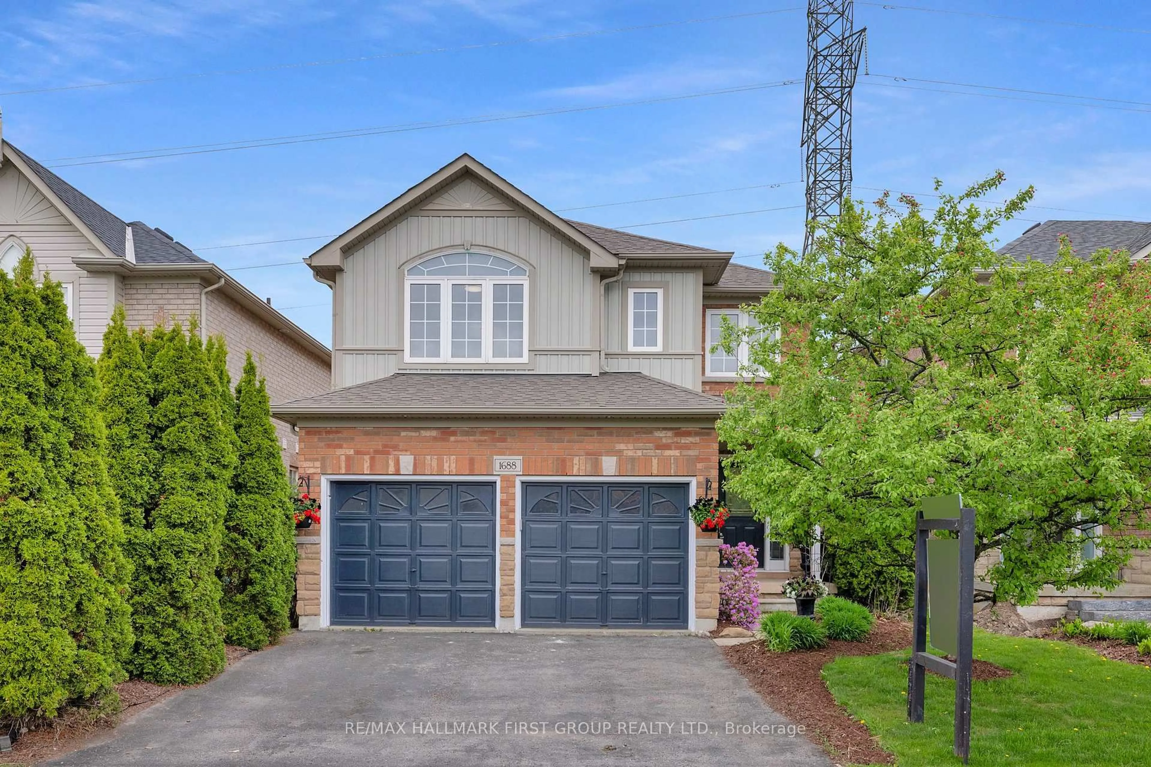 Home with brick exterior material, street for 1688 Whitestone Dr, Oshawa Ontario L1K 2K2