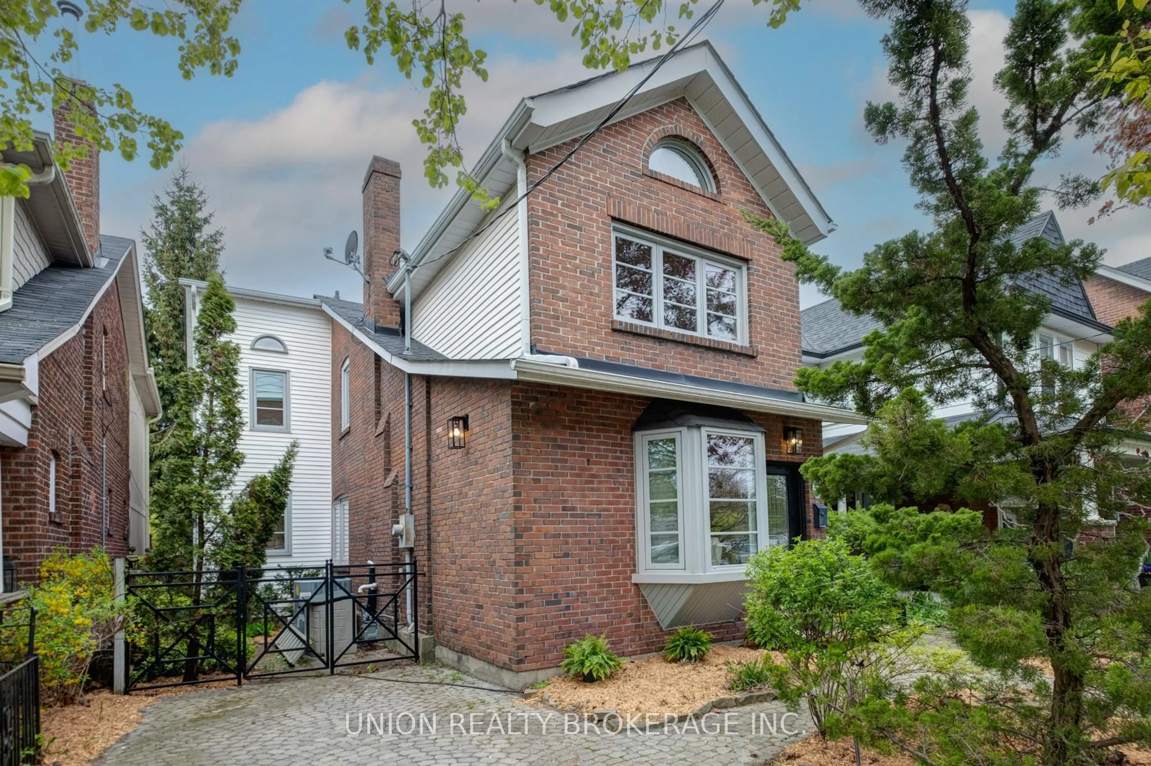 Home with brick exterior material, street for 52 Malvern Ave, Toronto Ontario M4E 3E3