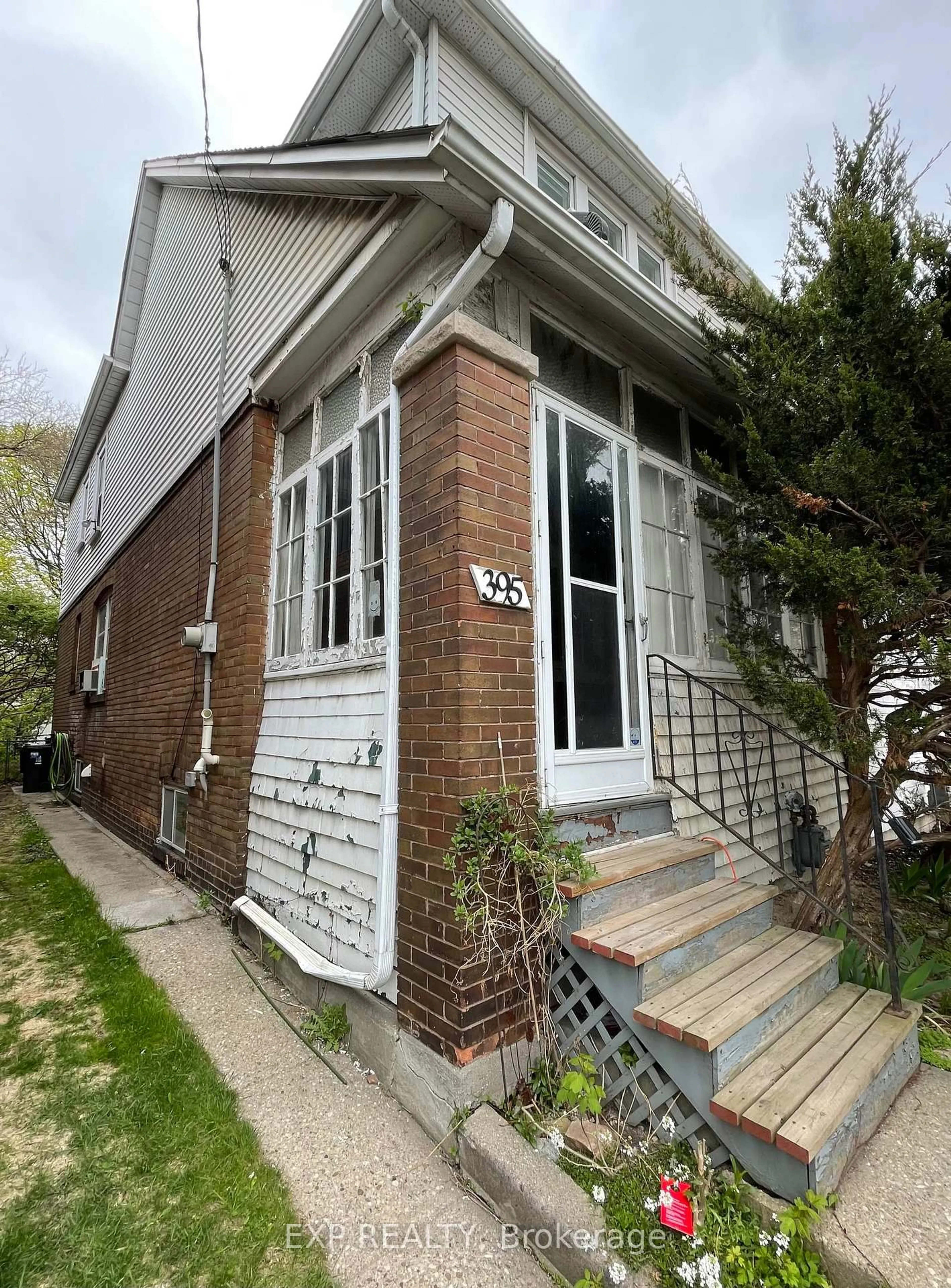 Home with brick exterior material, street for 395 Woodbine Ave, Toronto Ontario M4L 3P7