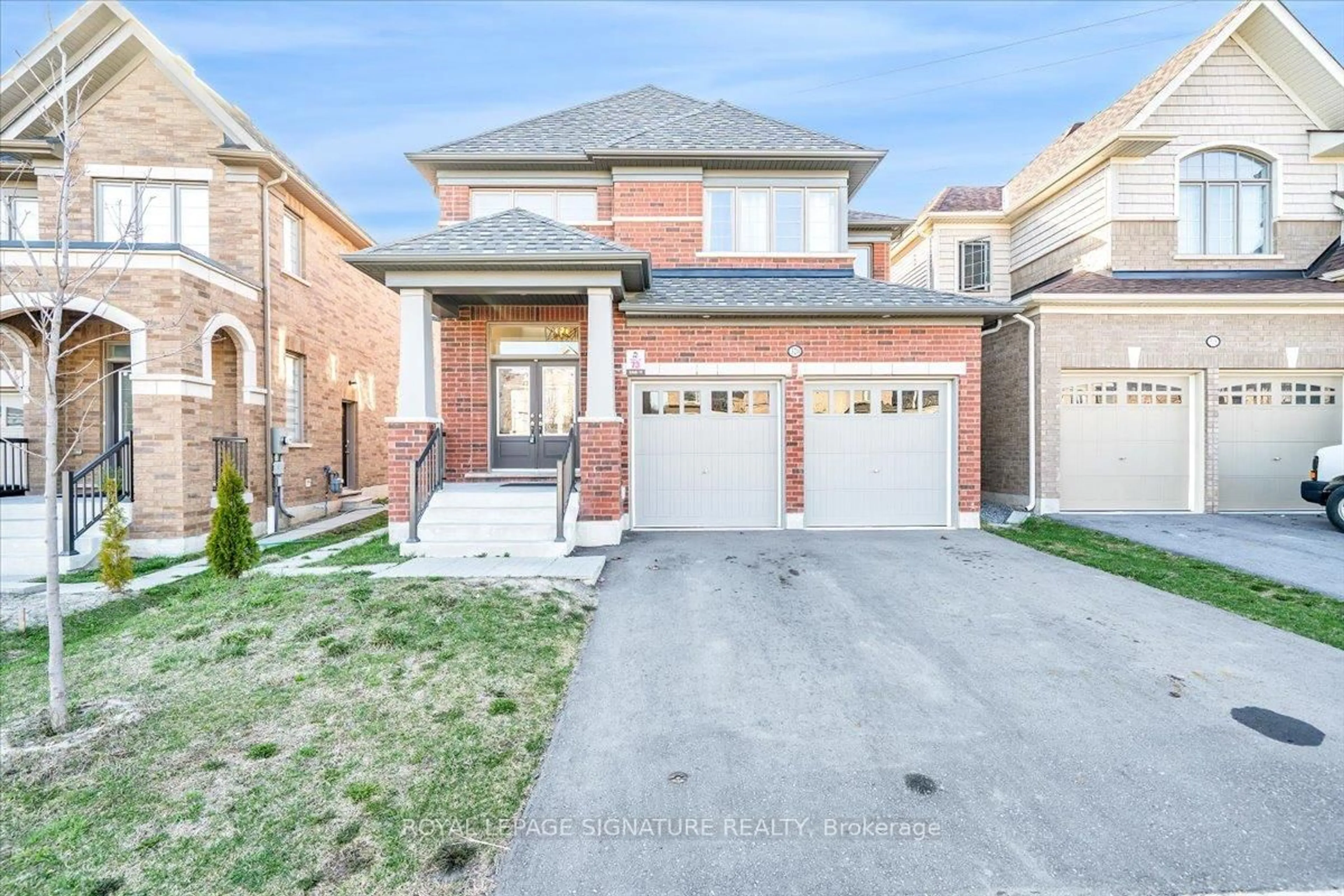 Home with brick exterior material, street for 320 Windfield's Farm Dr, Oshawa Ontario L1L 0M3