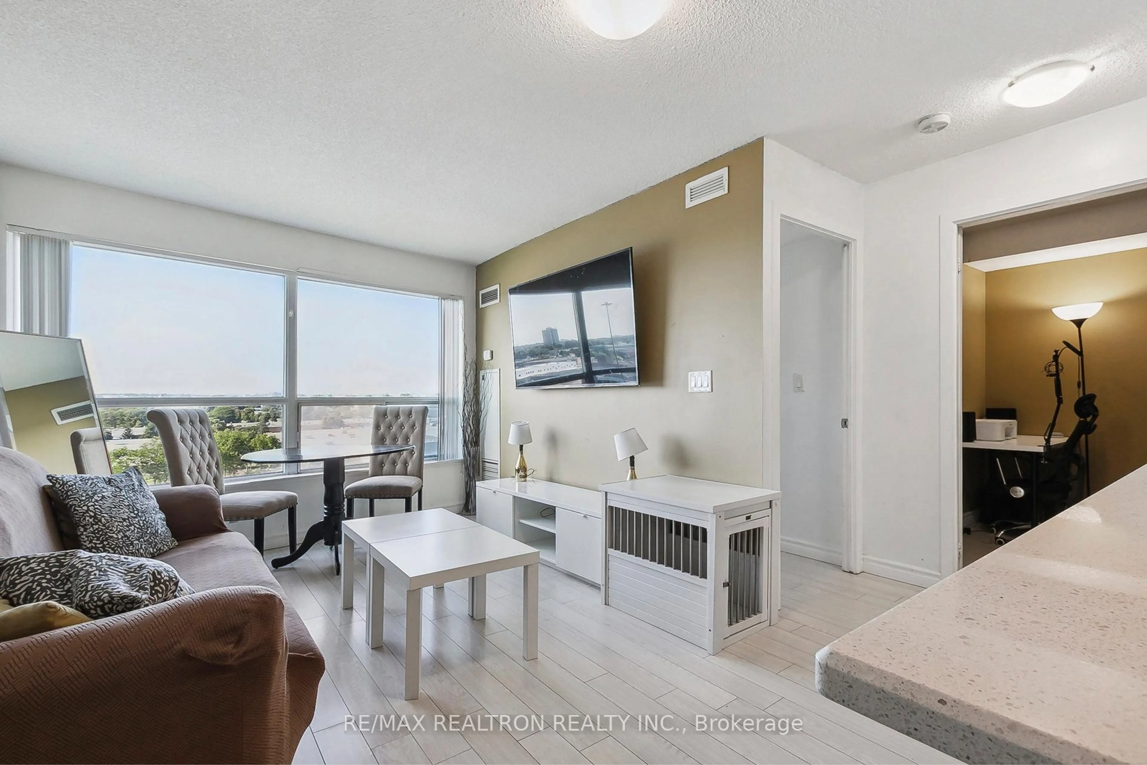 Living room with furniture, unknown for 36 Lee Centre Dr #915, Toronto Ontario M1H 3K2