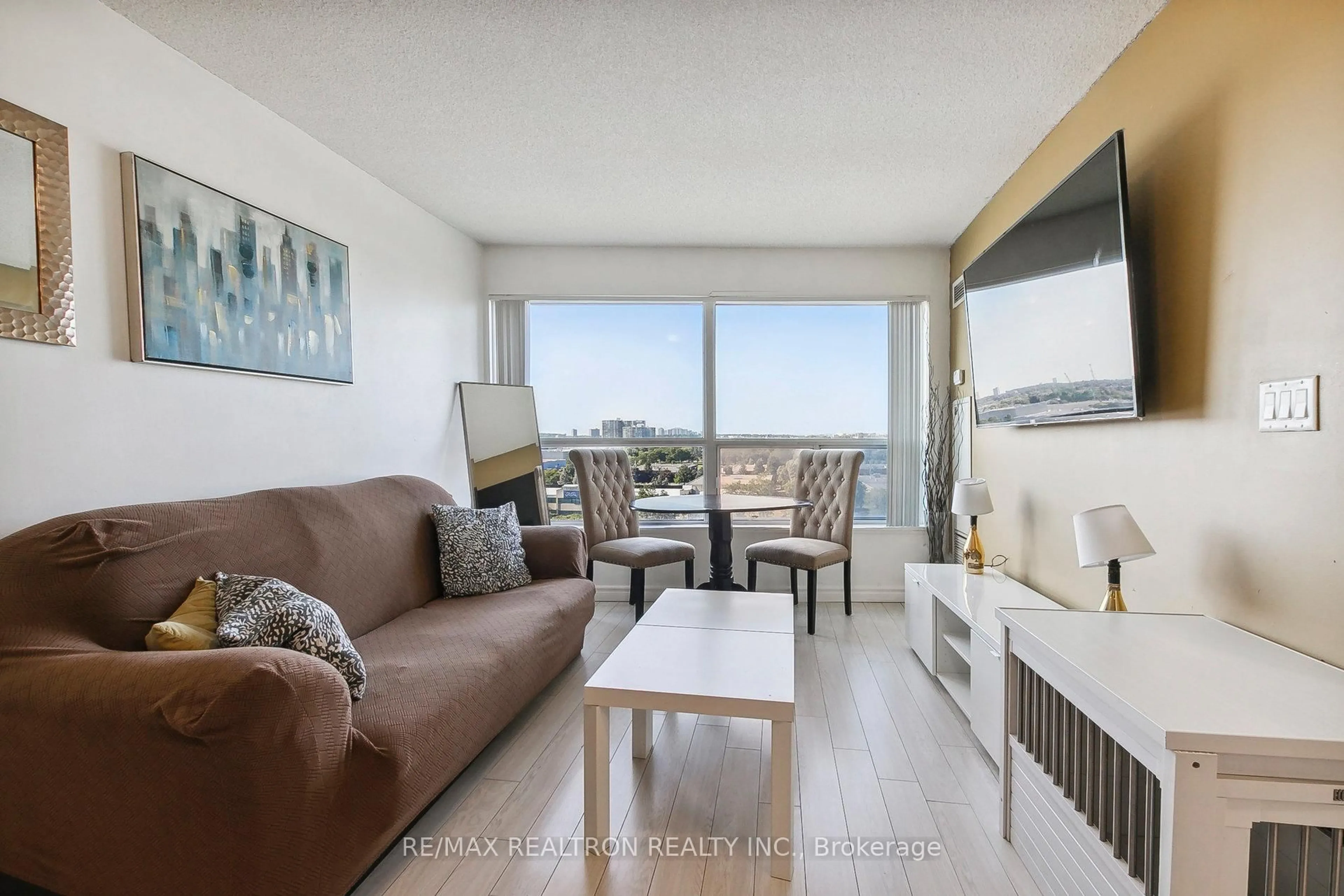 Living room with furniture, unknown for 36 Lee Centre Dr #915, Toronto Ontario M1H 3K2