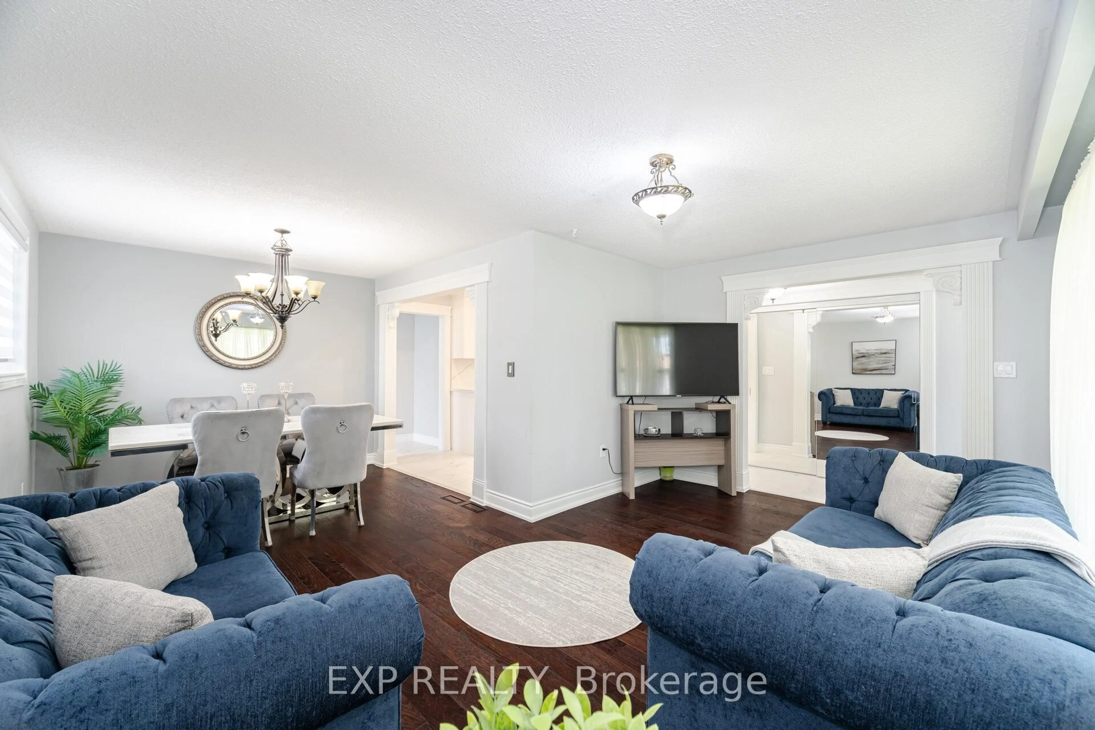 Living room with furniture, wood/laminate floor for 767 Tatra Dr, Oshawa Ontario L1J 6S5