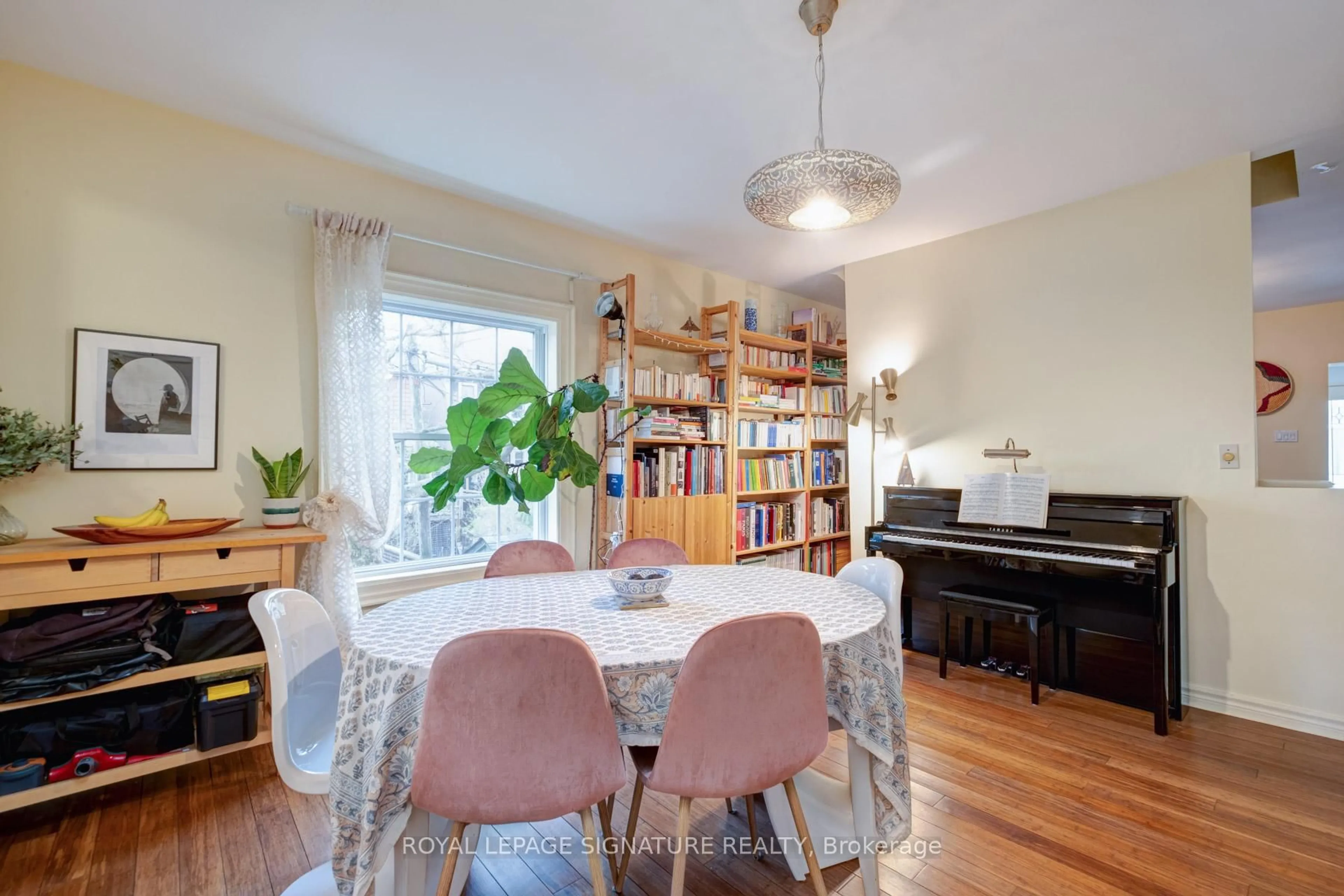 Dining room, wood/laminate floor for 82 Badgerow Ave, Toronto Ontario M4M 1V4