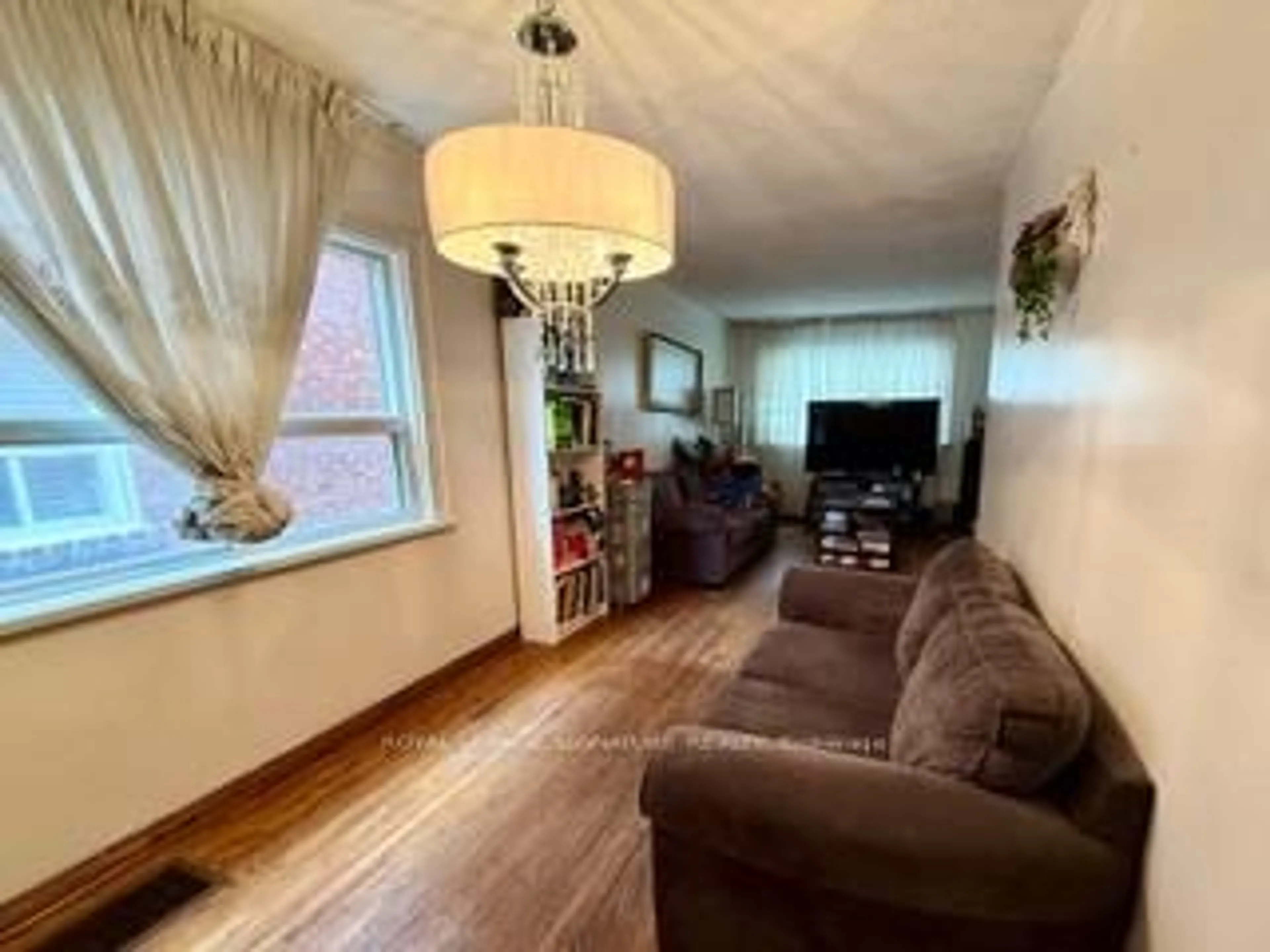 Living room with furniture, unknown for 28 Durant Ave, Toronto Ontario M4J 4V9