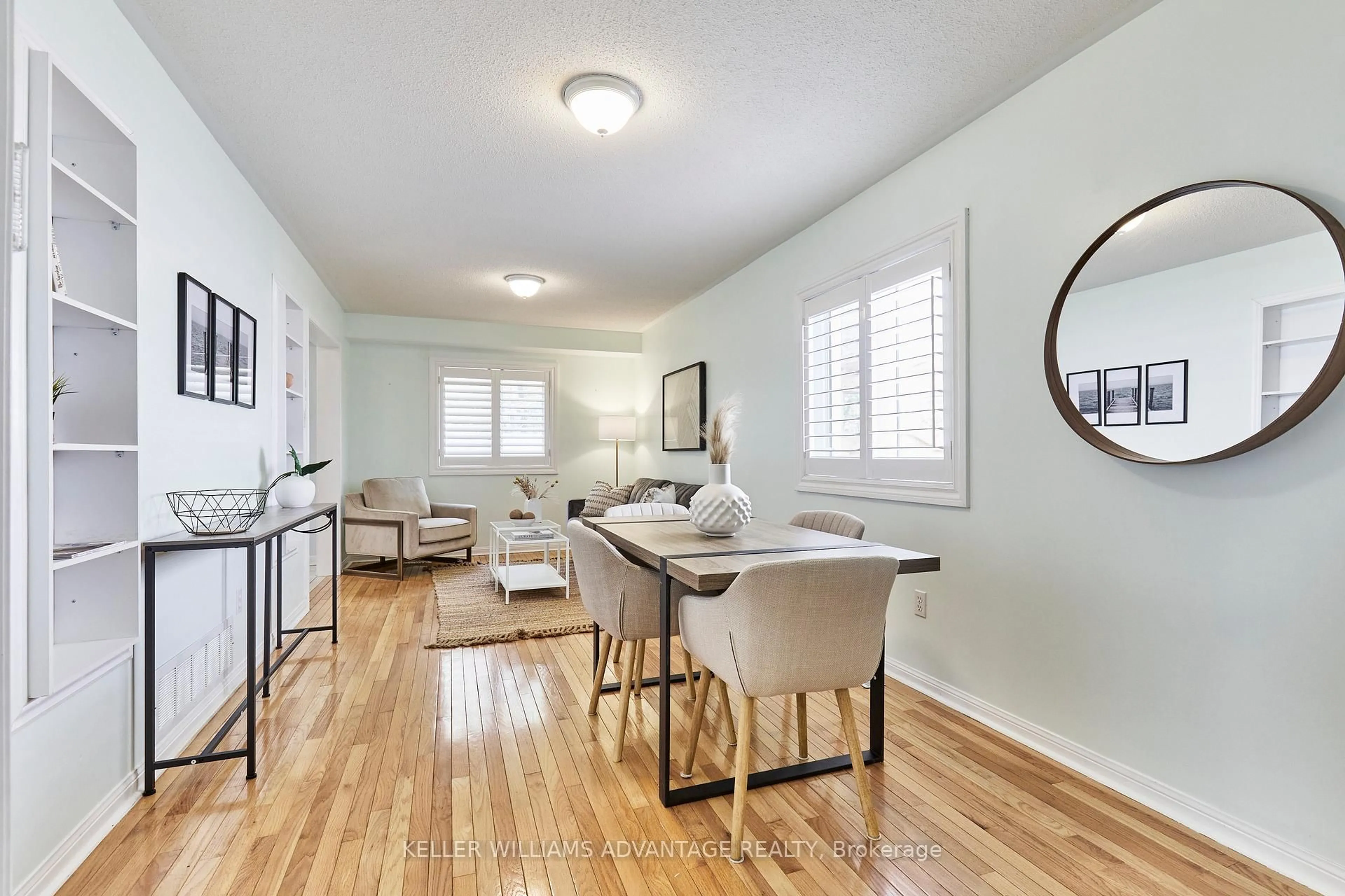 Living room with furniture, wood/laminate floor for 76 Piperbrook Cres, Toronto Ontario M1E 5G9