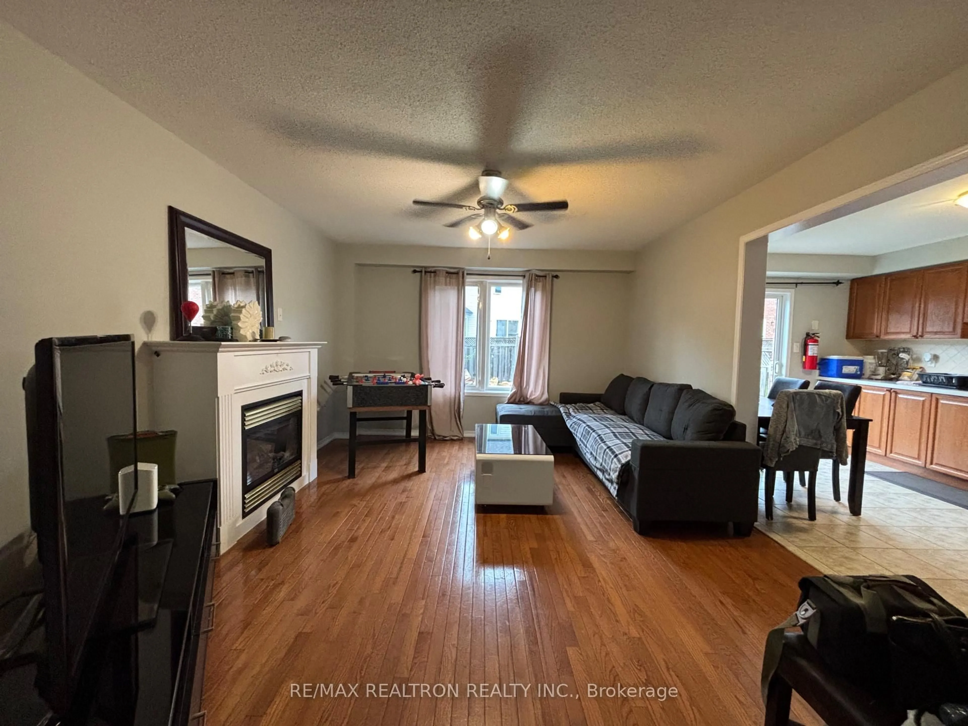 Living room with furniture, wood/laminate floor for 1986 Secretariat Pl, Oshawa Ontario L1L 1C8