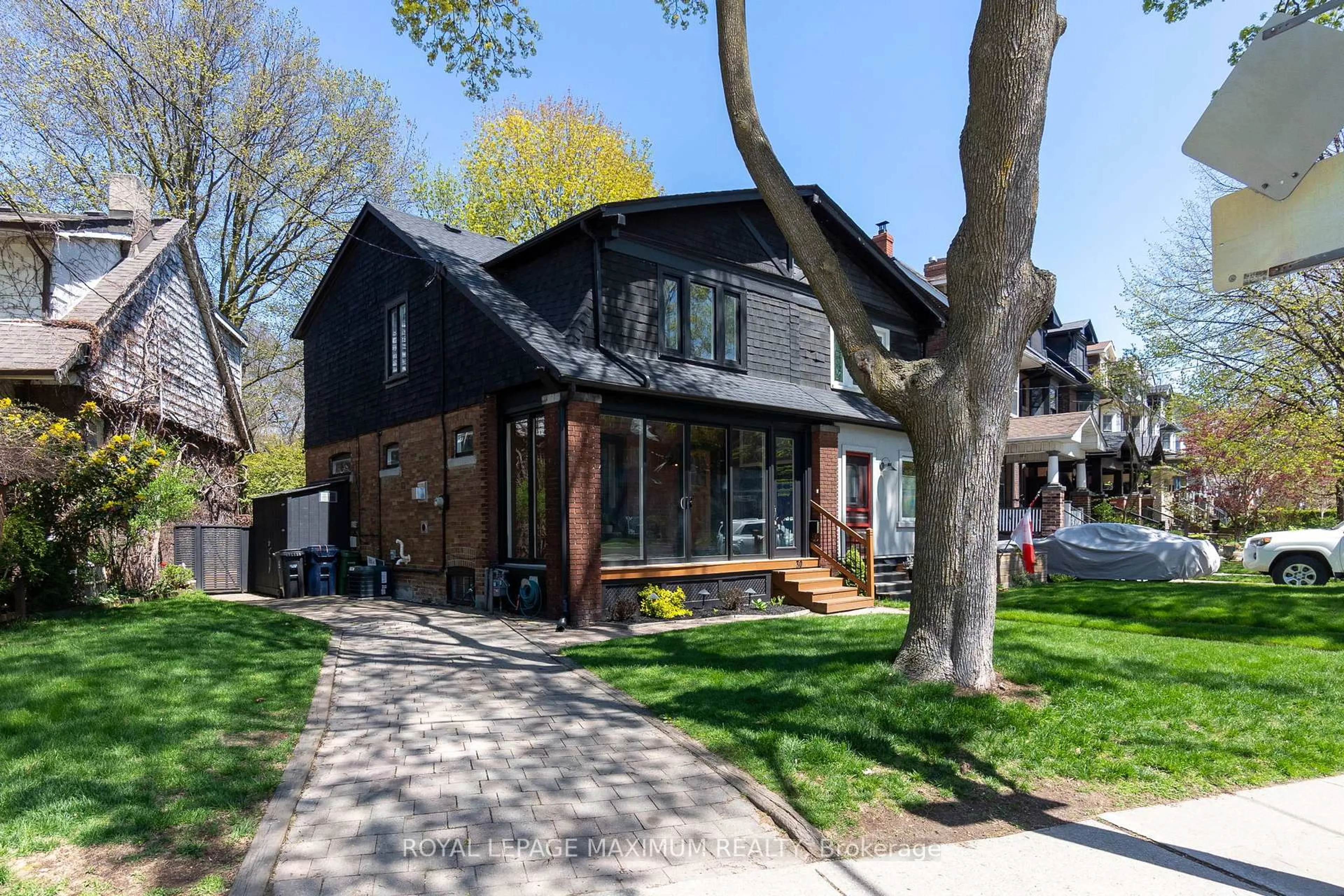 Home with brick exterior material, street for 30 Dixon Ave, Toronto Ontario M4L 1N3