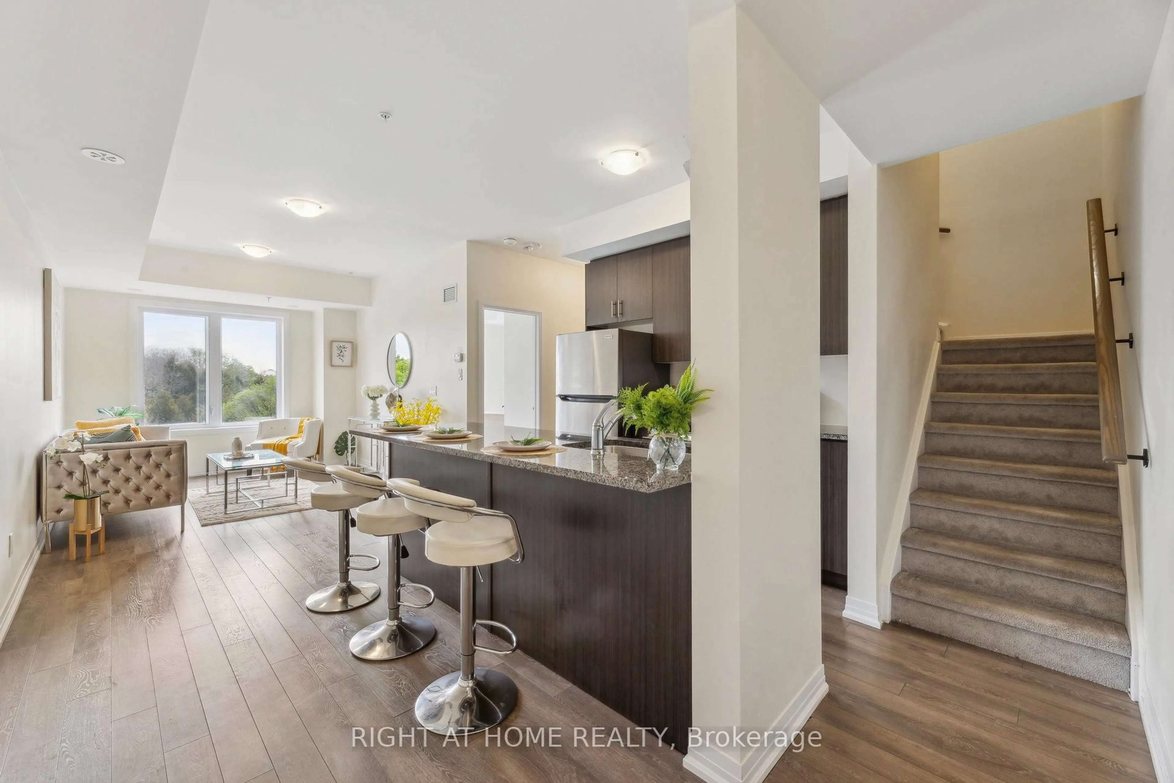 Open concept kitchen, wood/laminate floor for 2635 William Jackson Dr #814, Pickering Ontario L1X 0L3