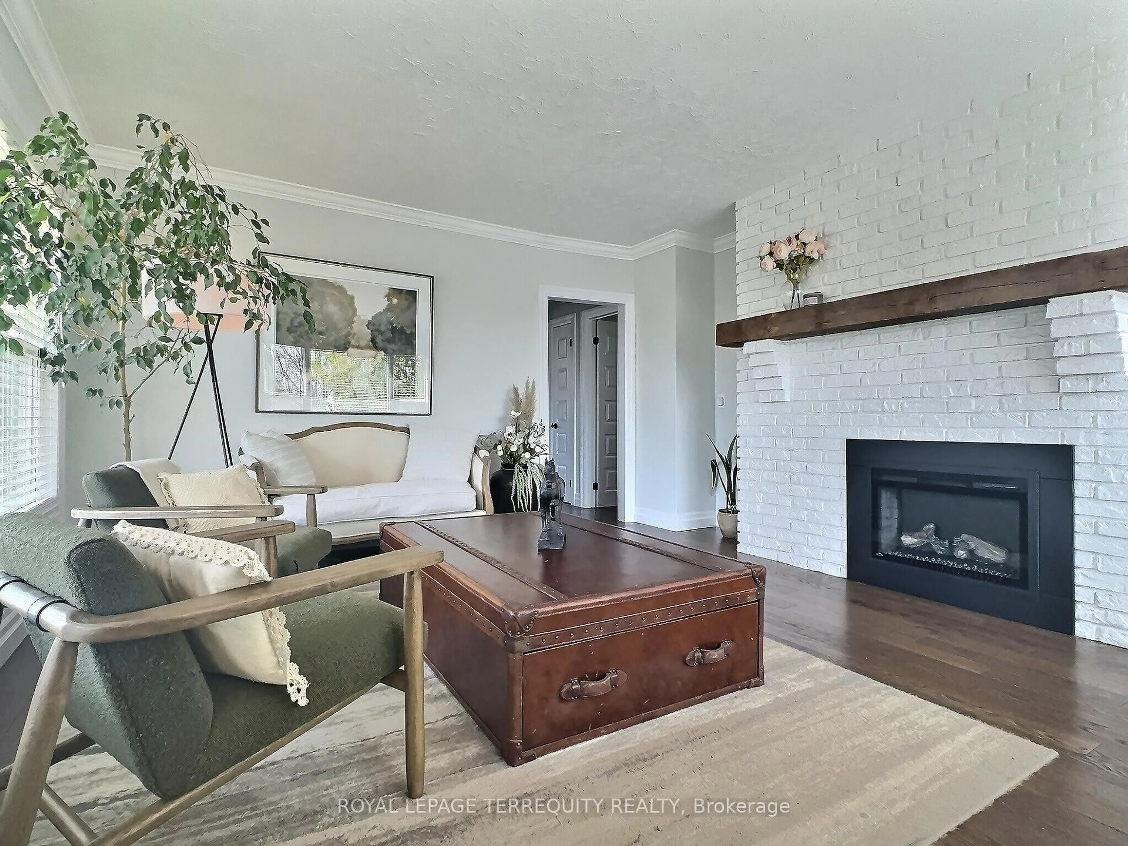 Living room with furniture, wood/laminate floor for 1289 Wecker Dr, Oshawa Ontario L1J 3P6