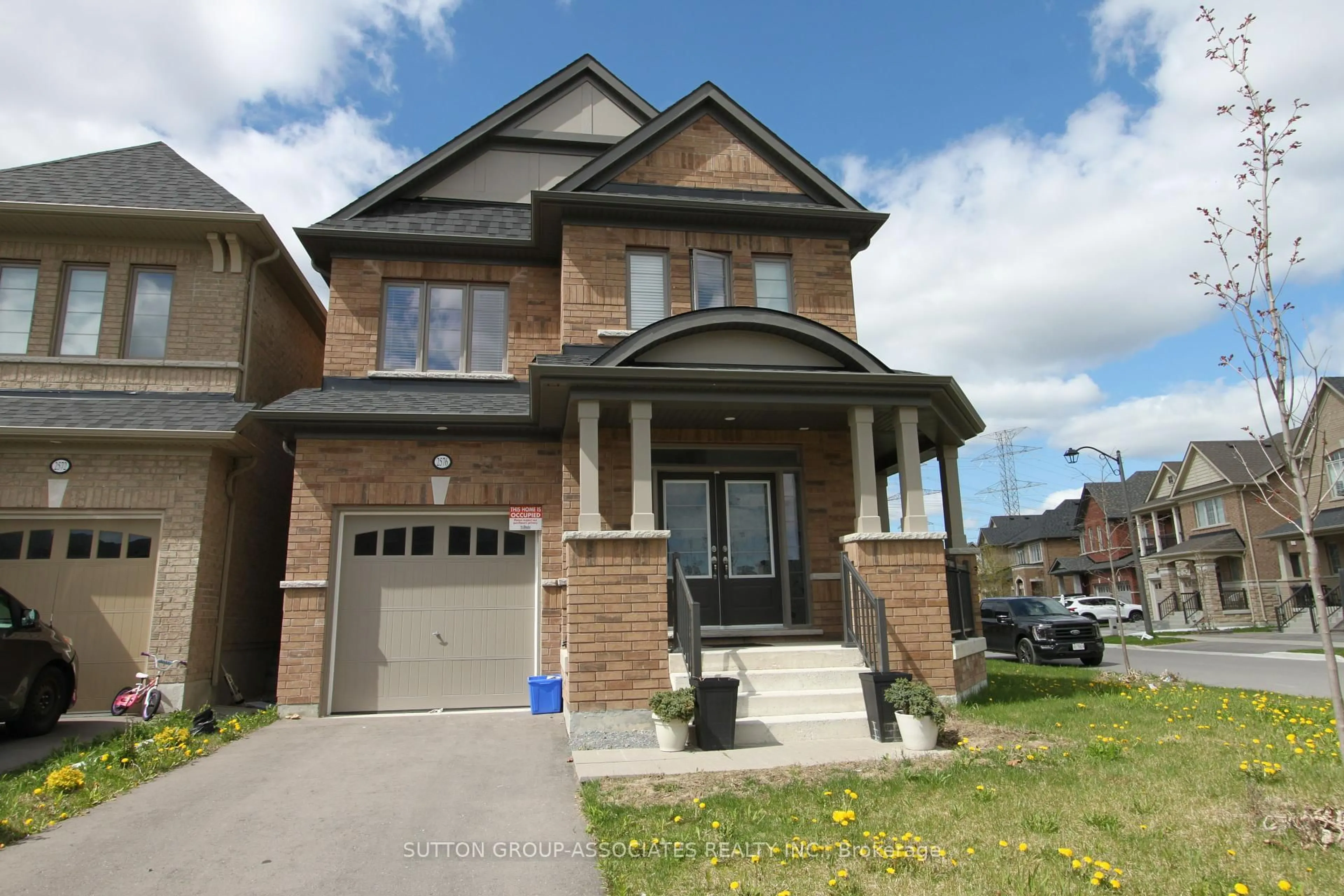 Home with brick exterior material, street for 2576 Orchestrate Dr, Oshawa Ontario L1L 0R4