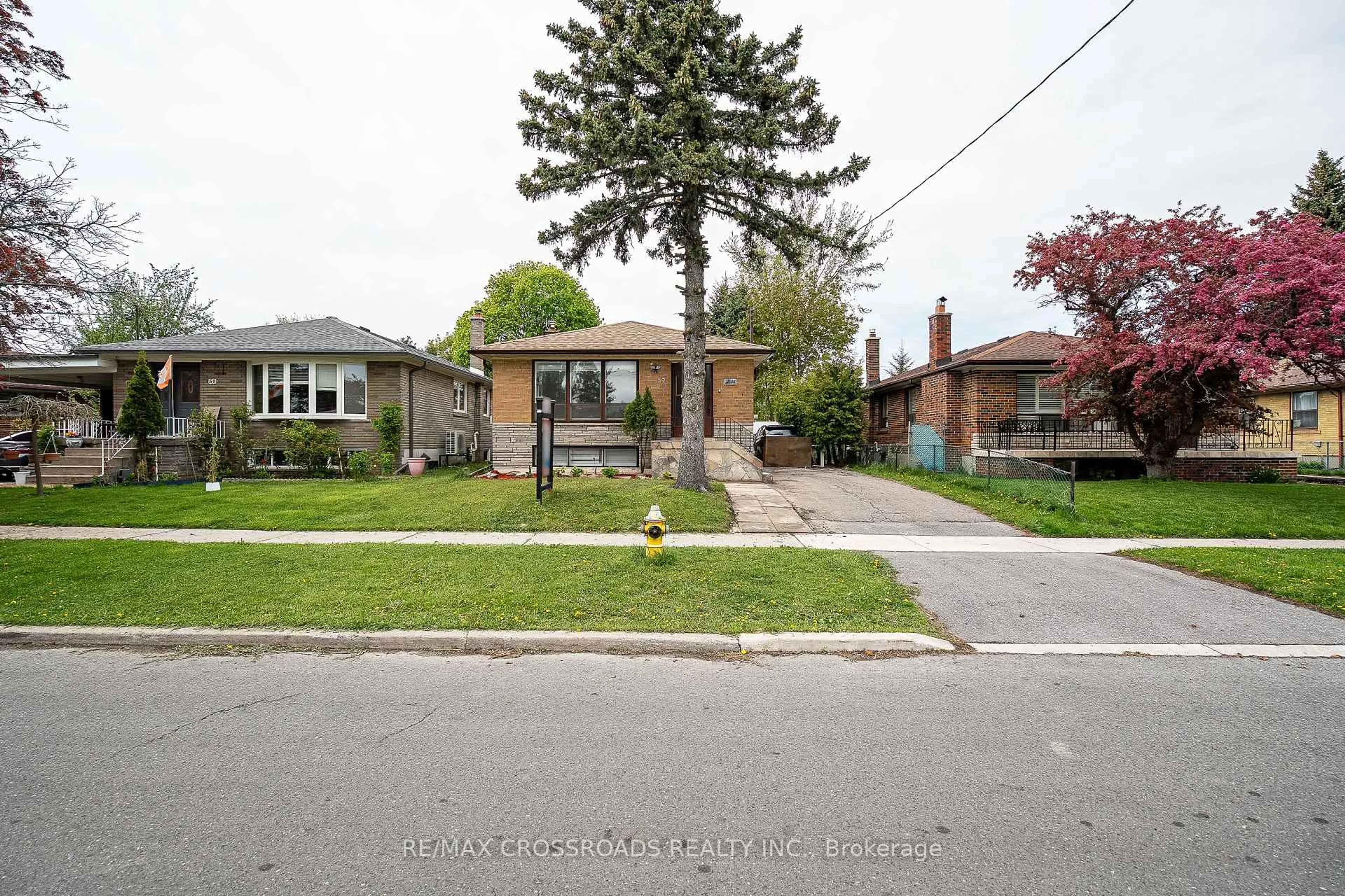 Home with brick exterior material, street for 52 Slan Ave, Toronto Ontario M1G 3B3