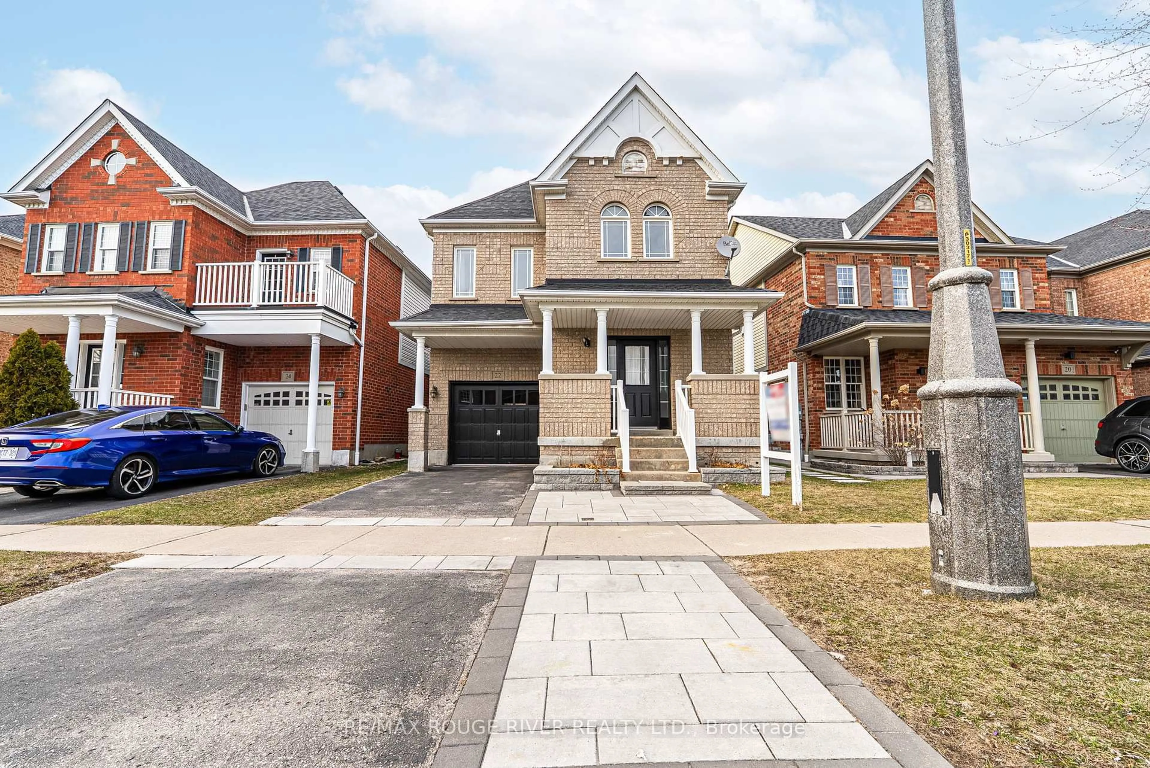 Home with brick exterior material, street for 22 Thackery Dr, Ajax Ontario L1T 0B7