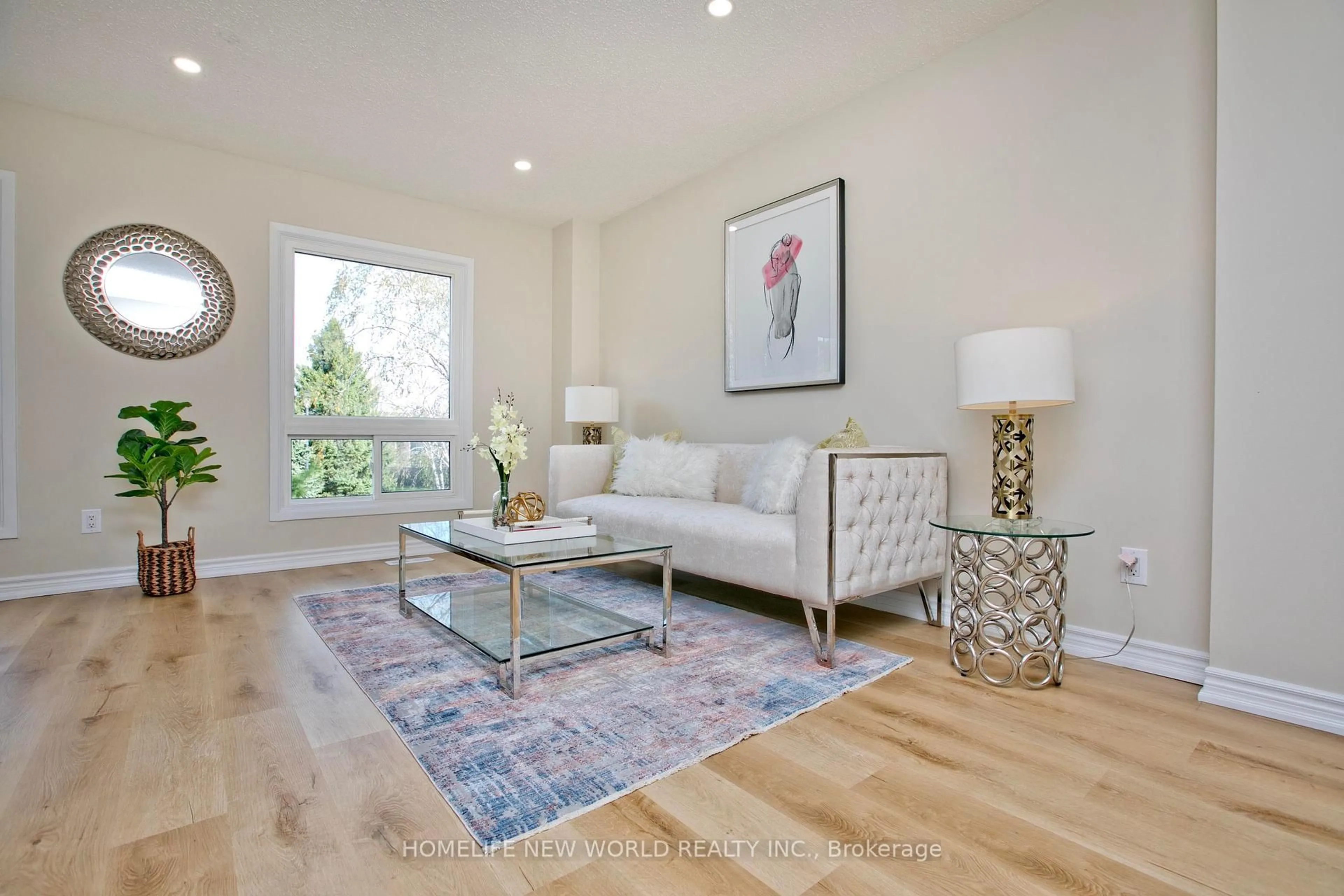 Living room with furniture, wood/laminate floor for 98 Seamist Cres, Toronto Ontario M1V 3K4