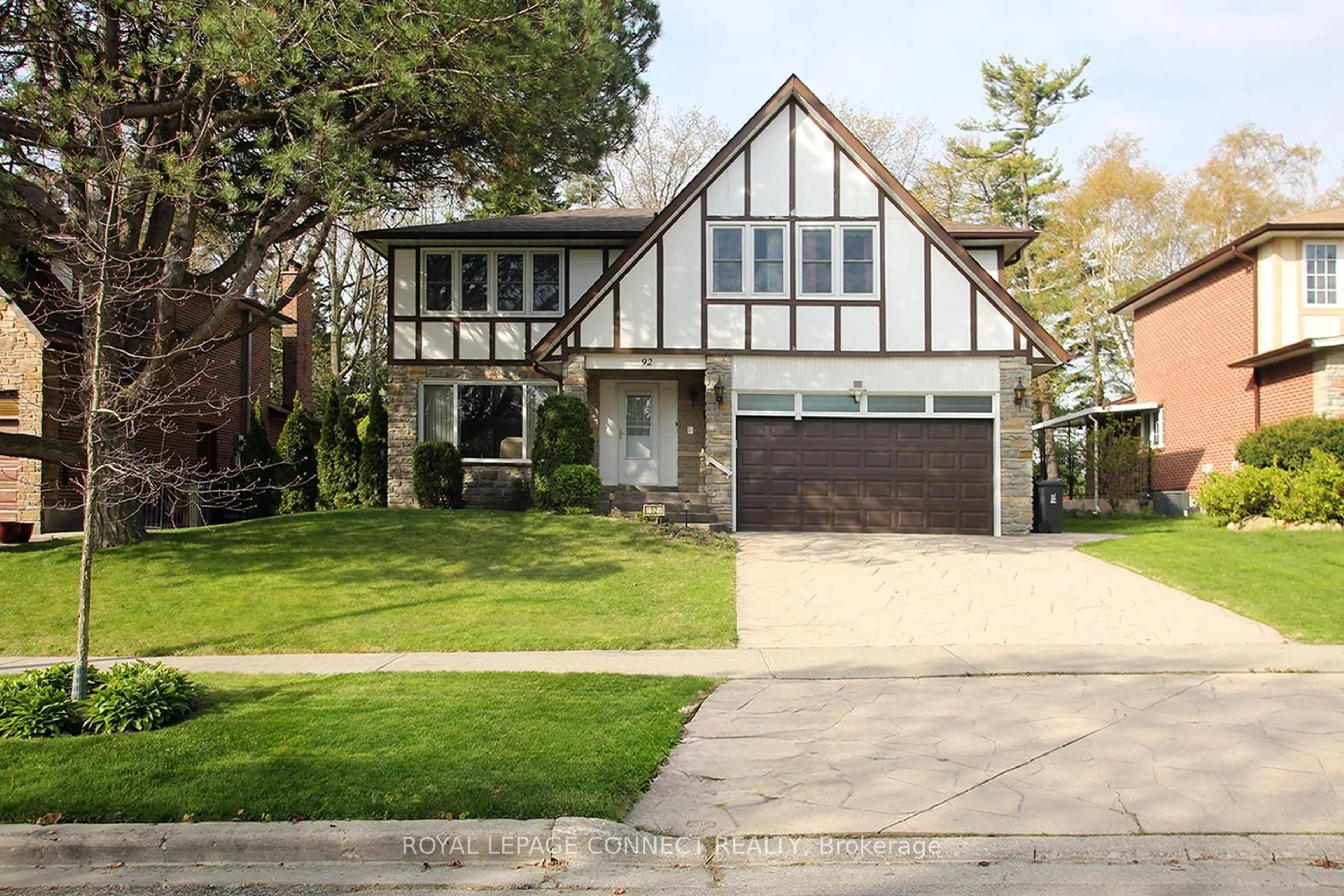 Home with vinyl exterior material, street for 92 Holmcrest Tr, Toronto Ontario M1C 1V5