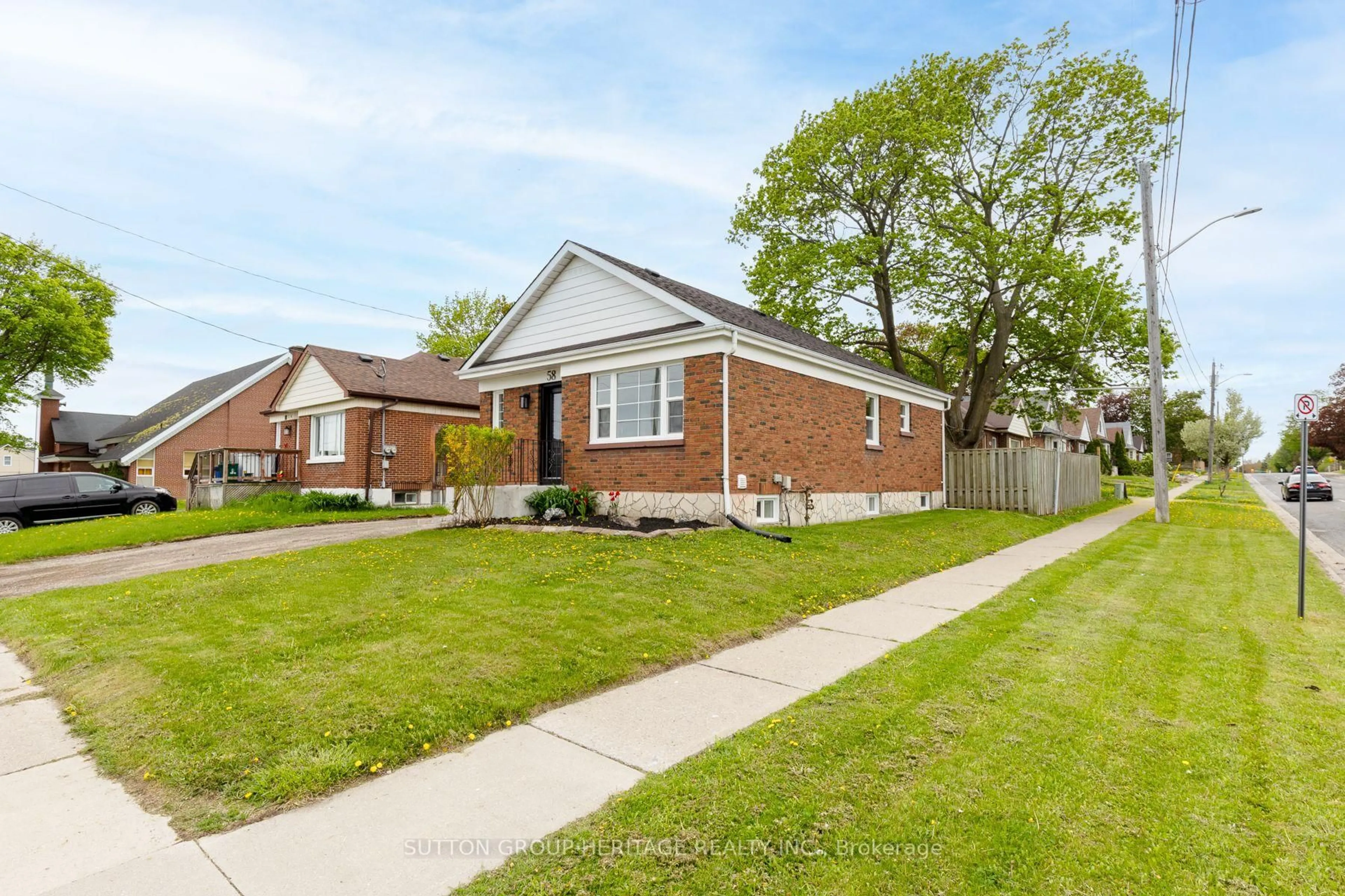 Home with brick exterior material, street for 58 Wilson Rd, Oshawa Ontario L1G 6C8