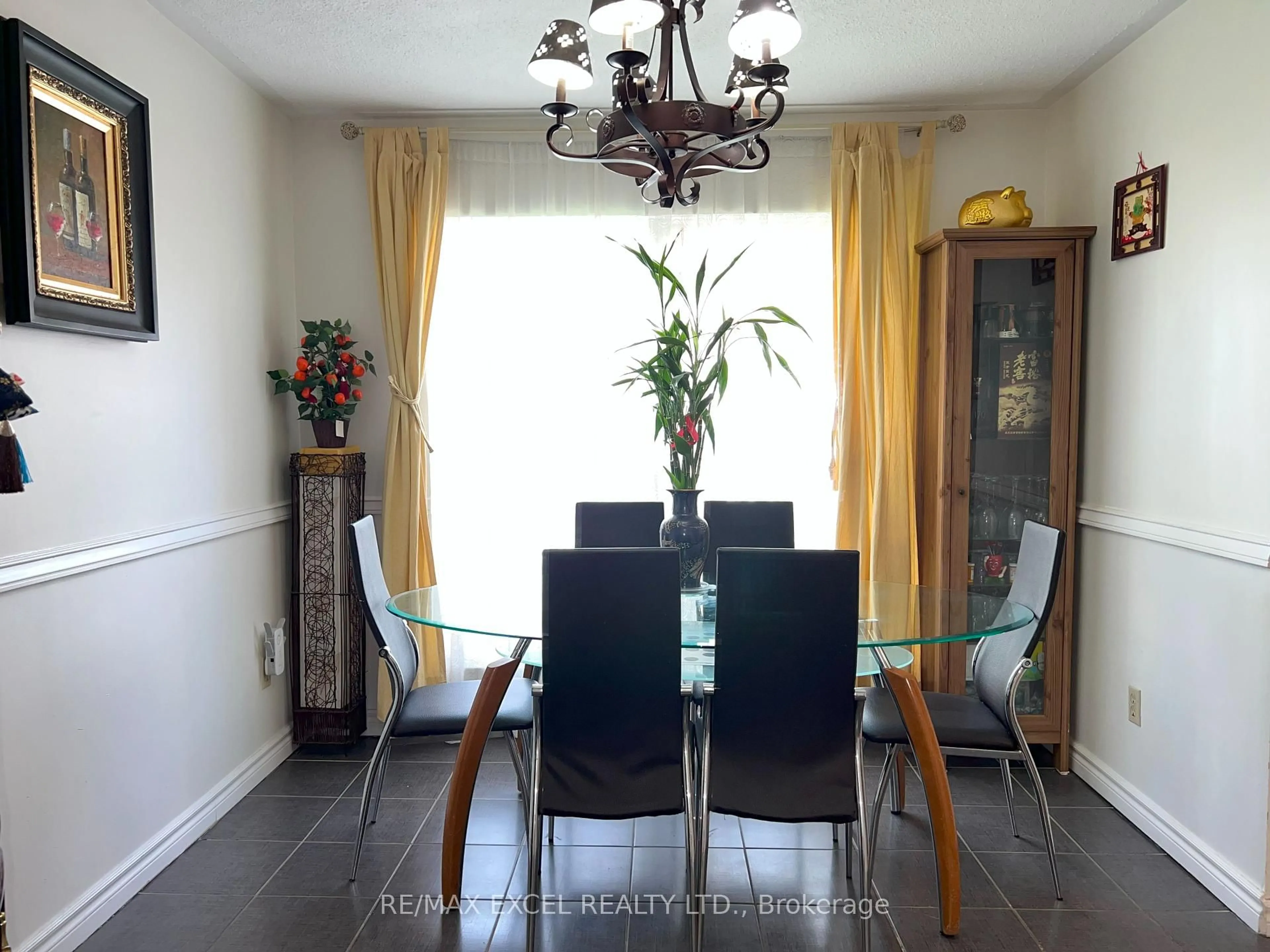 Dining room, wood/laminate floor for 2075 Warden Ave #35, Toronto Ontario M1T 3R1