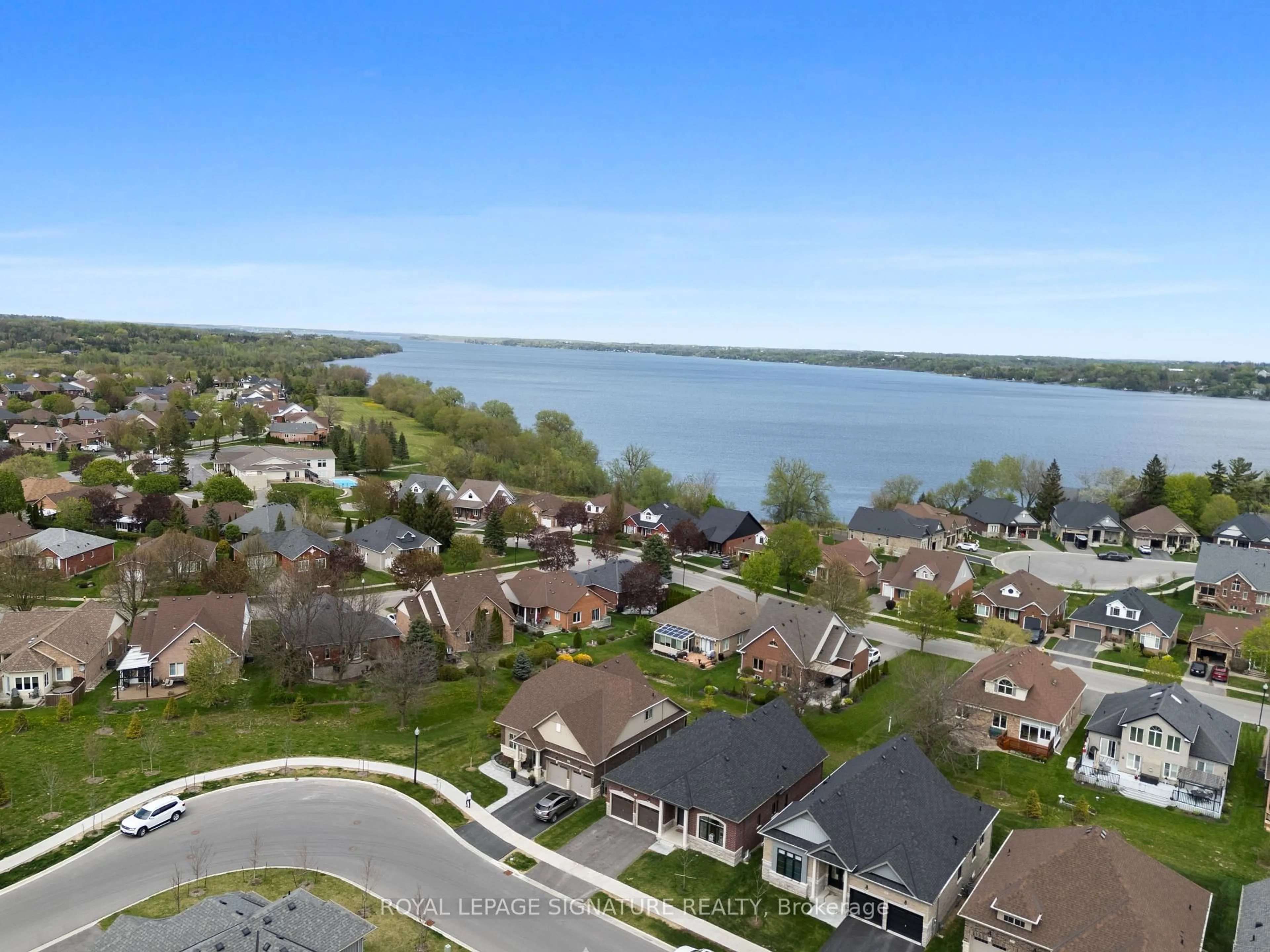 A pic from outside/outdoor area/front of a property/back of a property/a pic from drone, water/lake/river/ocean view for 85 Holtby Crt, Scugog Ontario L9L 0B4
