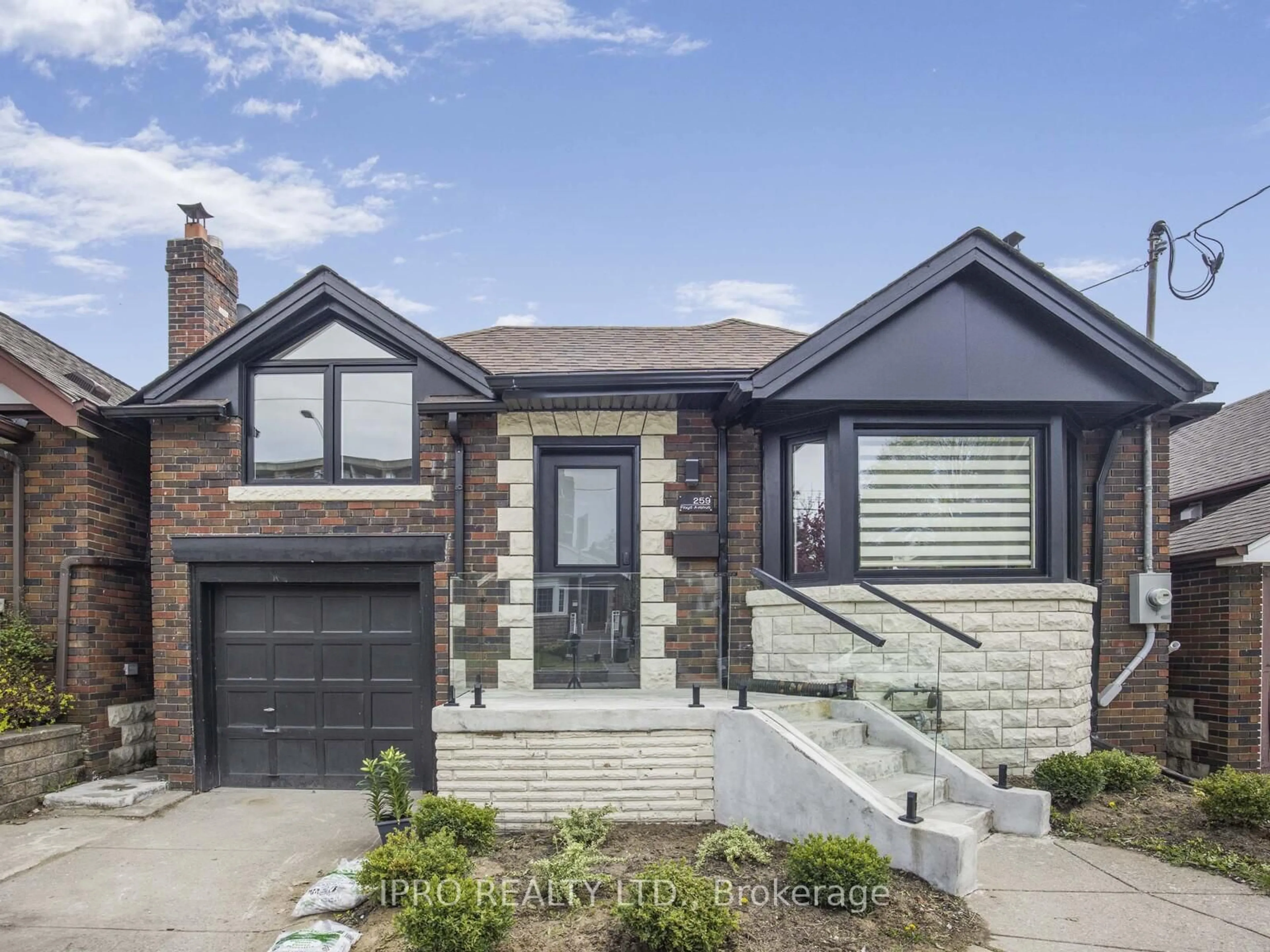Home with brick exterior material, street for 259 Floyd Ave, Toronto Ontario M4J 2J4