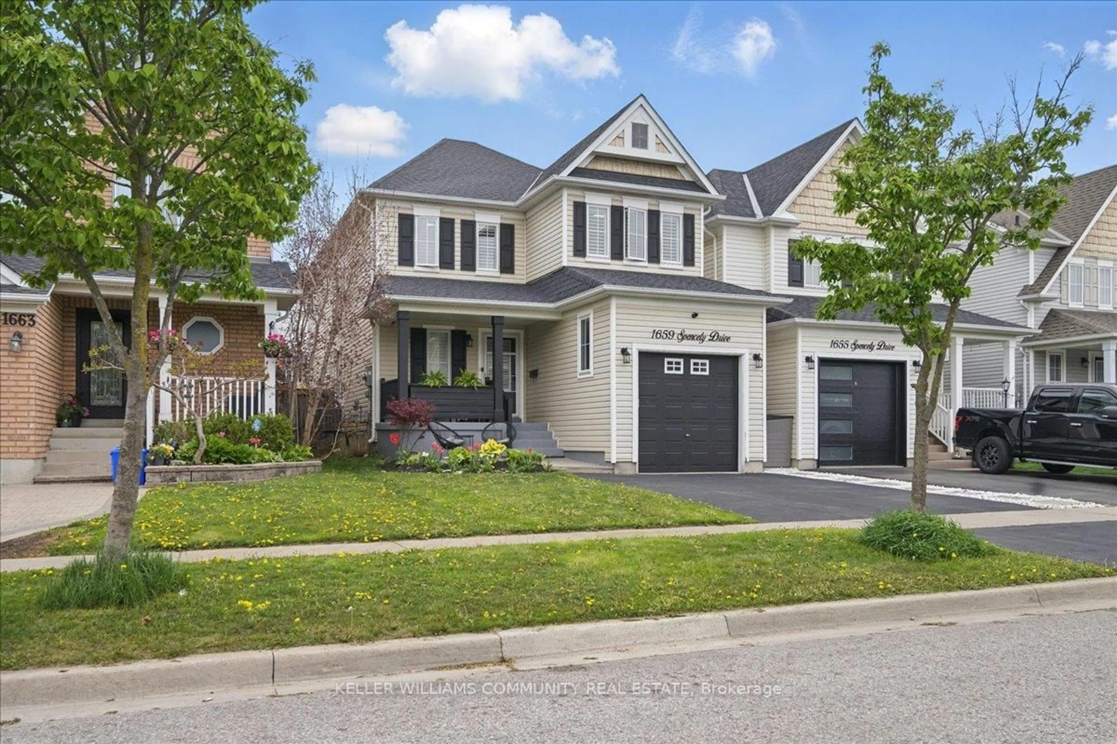 Home with vinyl exterior material, street for 1659 Spencely Dr, Oshawa Ontario L1K 0B3