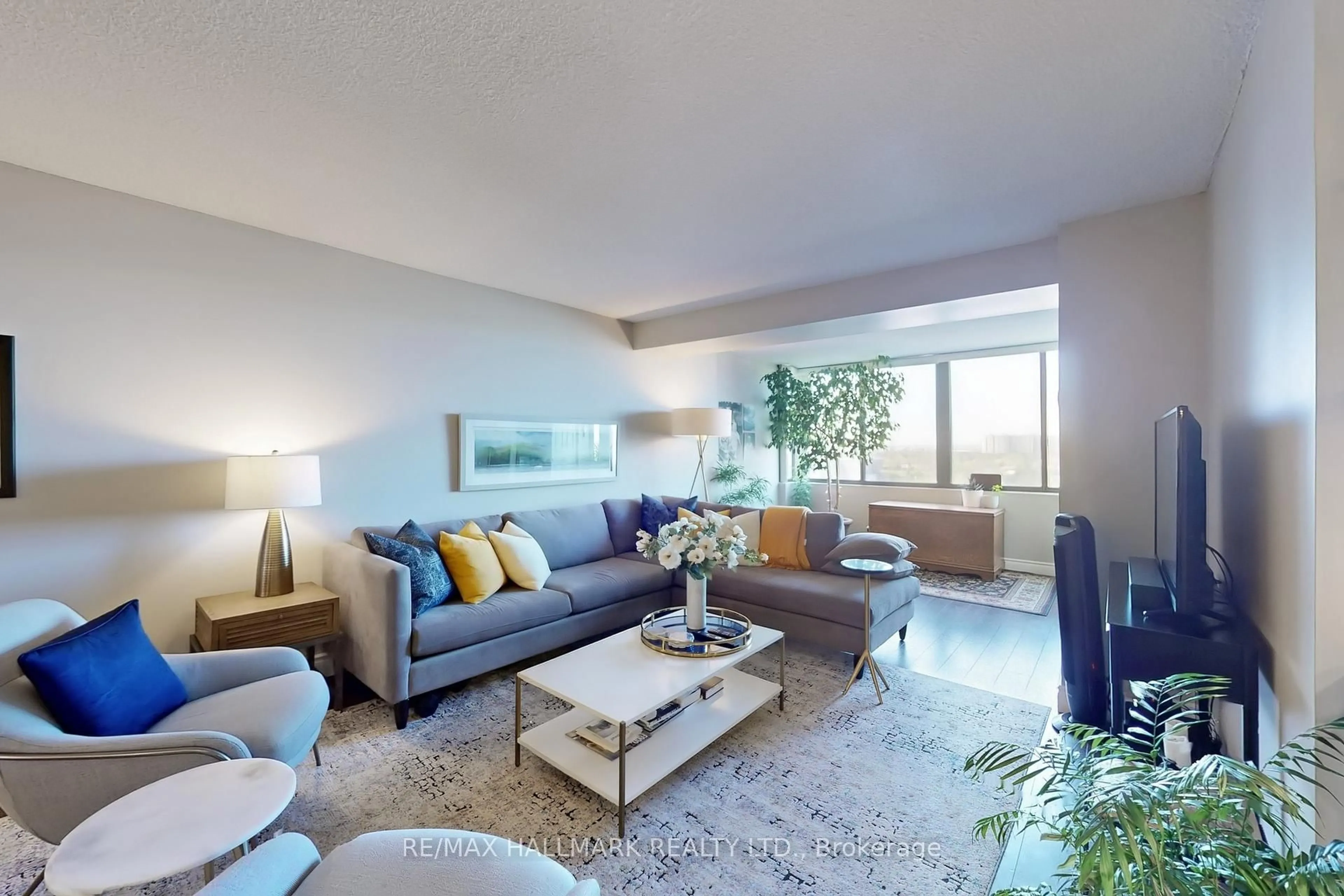Living room with furniture, unknown for 2350 Bridletowne Circ #1102, Toronto Ontario M1W 3E6
