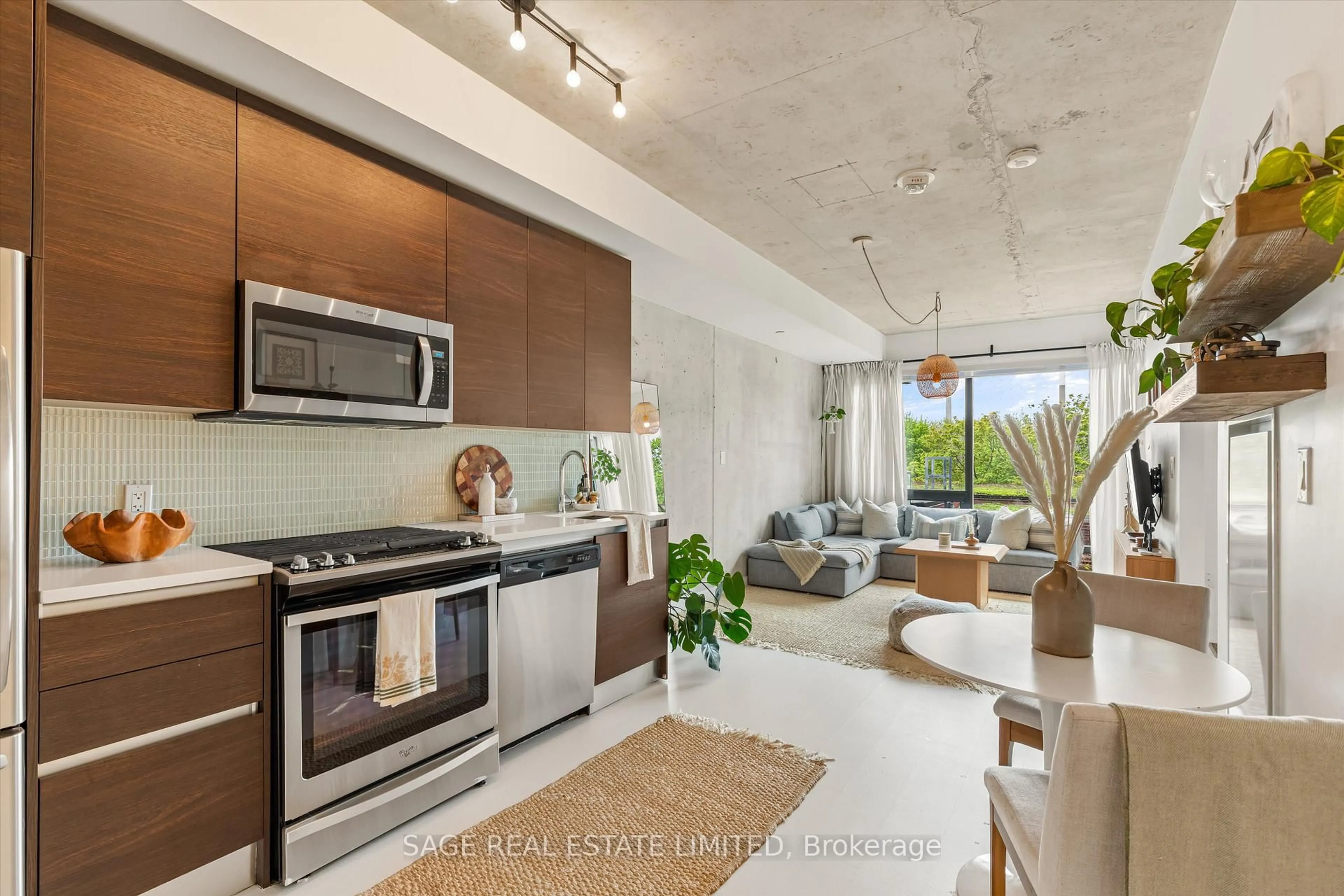Open concept kitchen, ceramic/tile floor for 246 Logan Ave #406, Toronto Ontario M4M 0E9