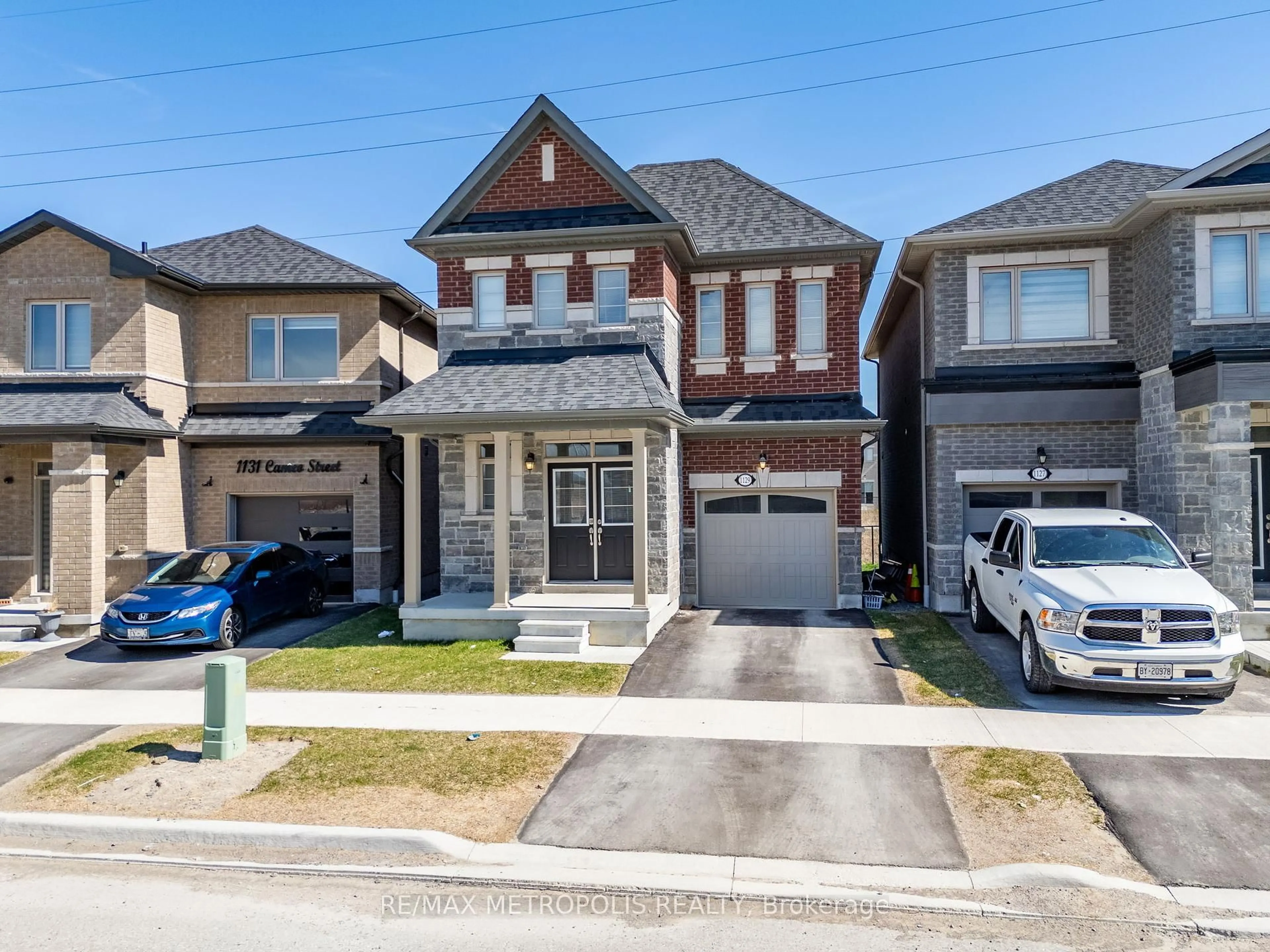 Home with brick exterior material, street for 1129 CAMEO St, Pickering Ontario L1X 0L7