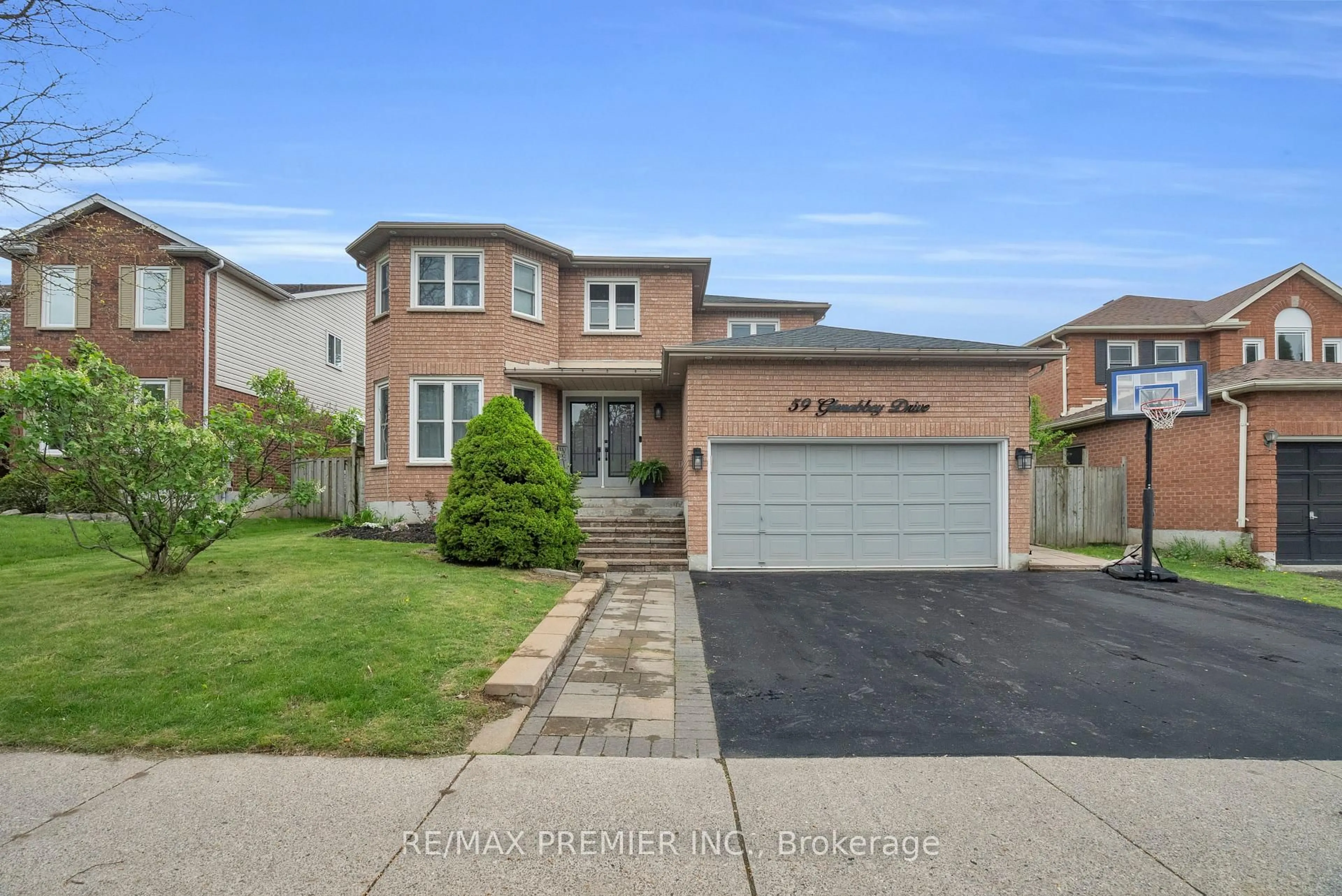 Home with brick exterior material, street for 59 Glenabbey Dr, Clarington Ontario L1E 2B5