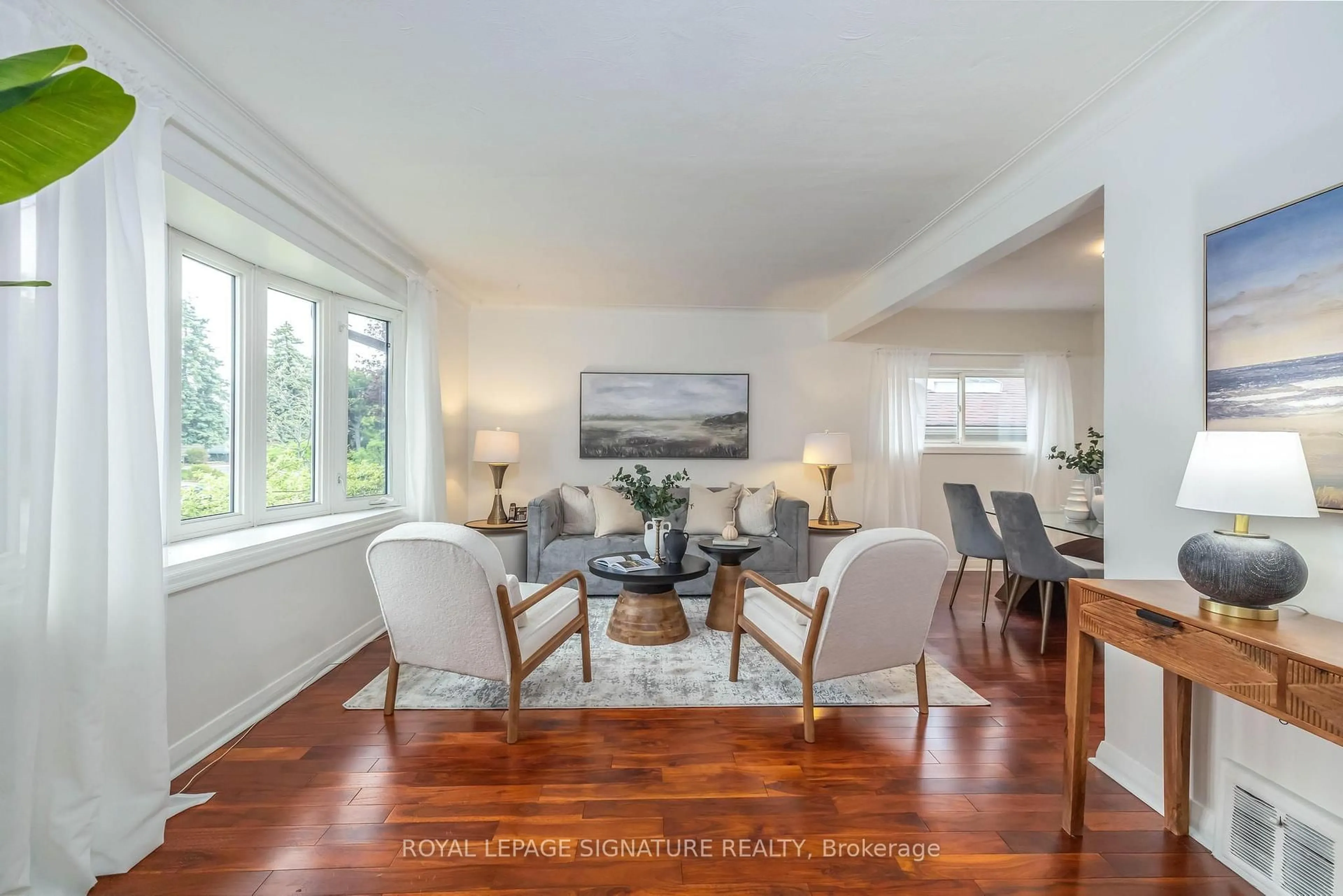 Dining room, wood/laminate floor for 93 Flora Dr, Toronto Ontario M1P 1A5