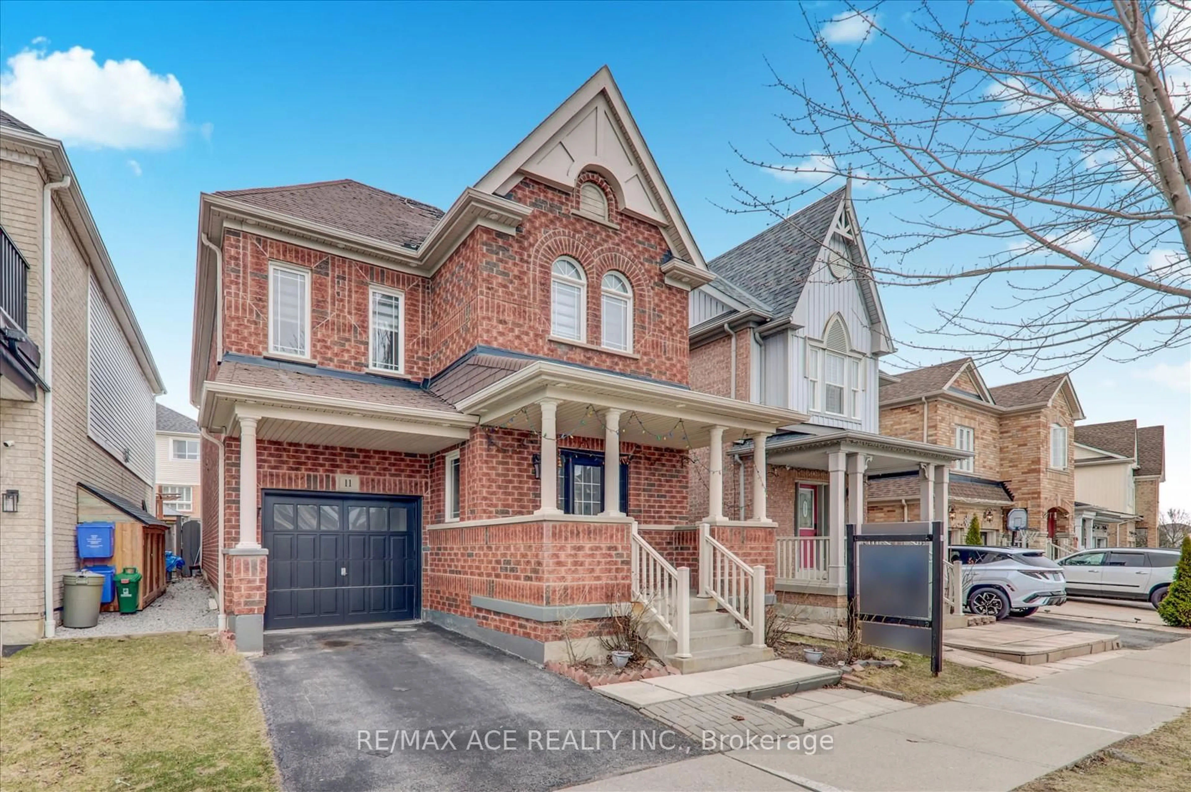 Home with brick exterior material, street for 11 Middlecote Dr, Ajax Ontario L1T 0A4