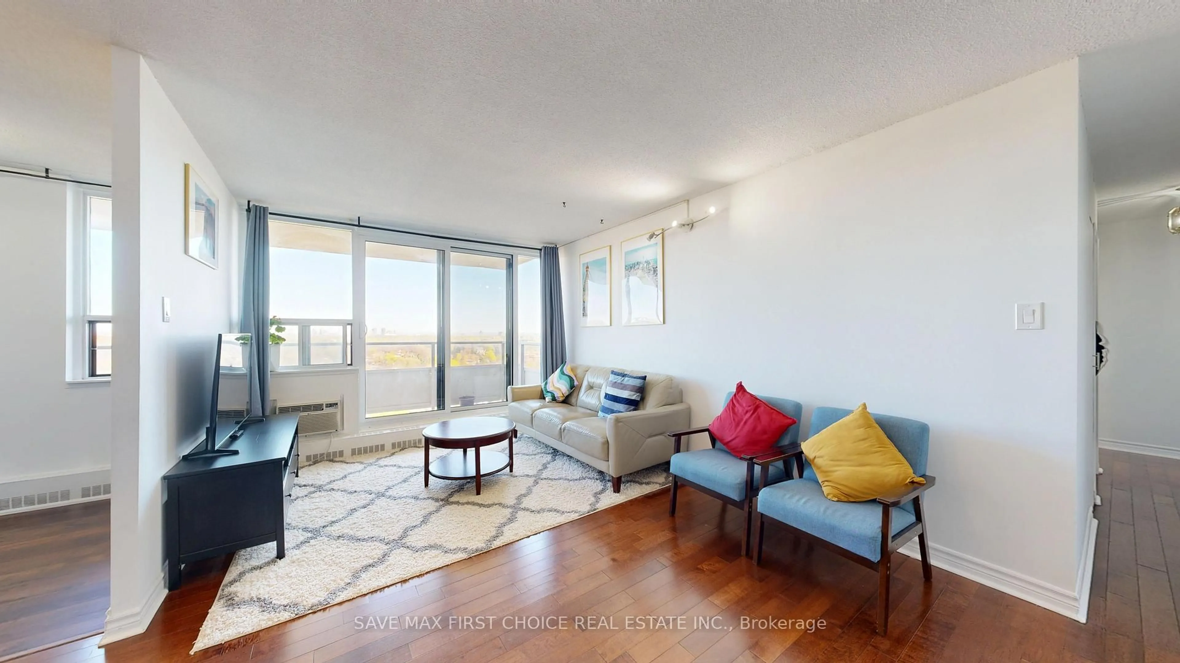 Living room with furniture, wood/laminate floor for 15 Torrance Rd #1401, Toronto Ontario M1J 3K2