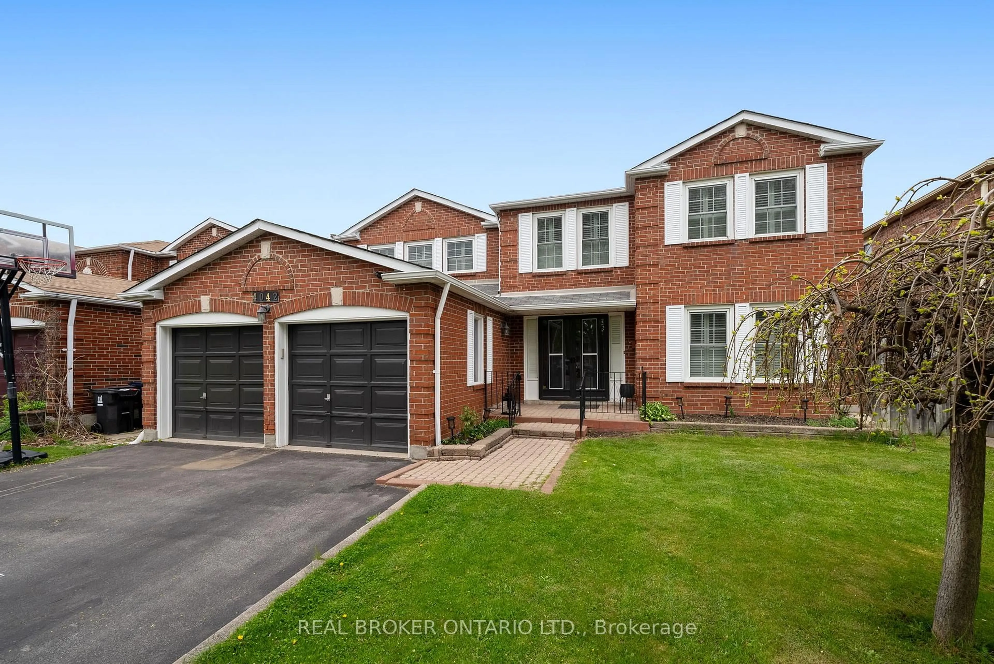 Home with brick exterior material, street for 4042 Ellesmere Rd, Toronto Ontario M1C 1H7