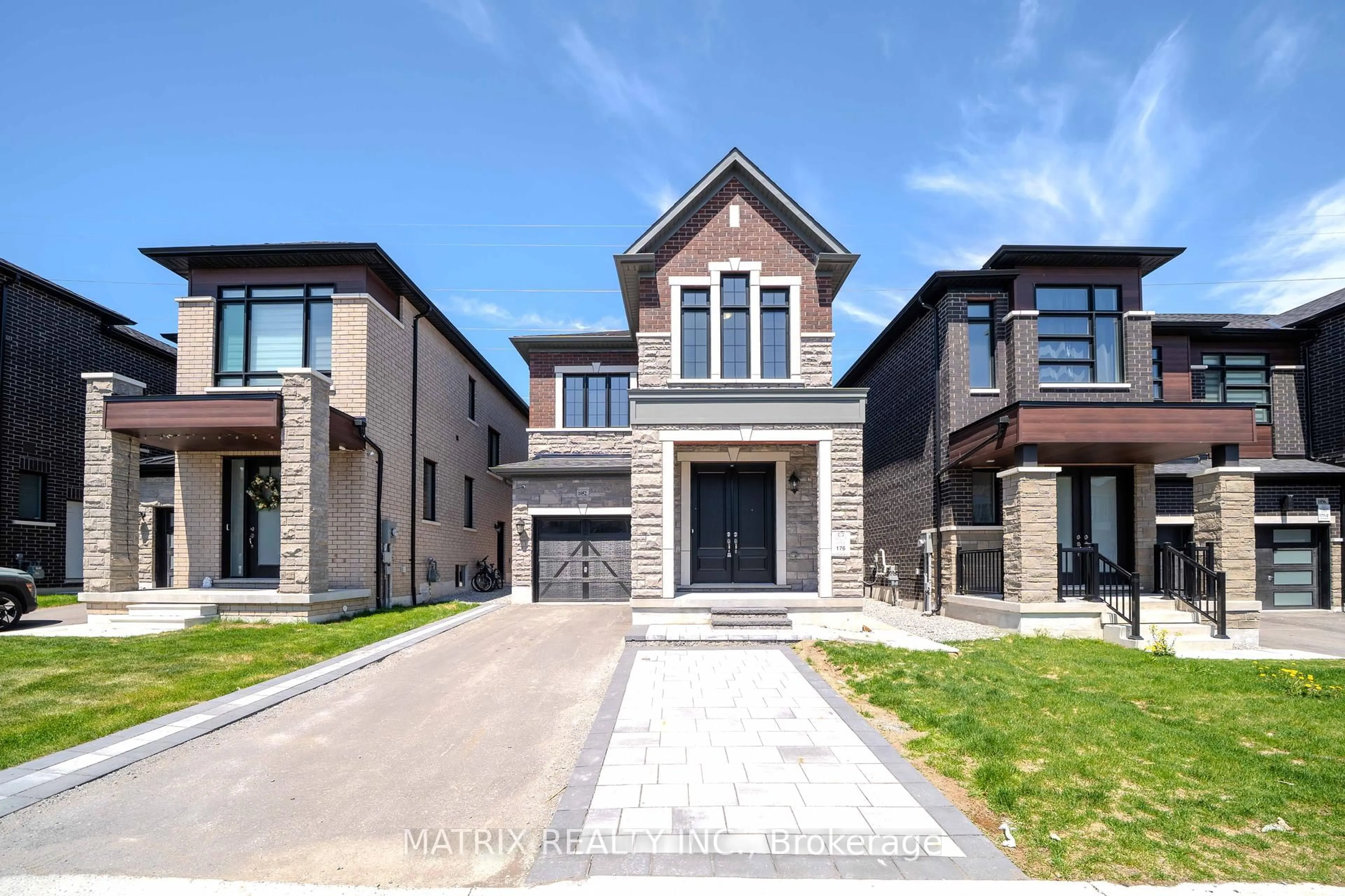Home with brick exterior material, street for 1052 Skyridge Blvd, Pickering Ontario L1X 0G5