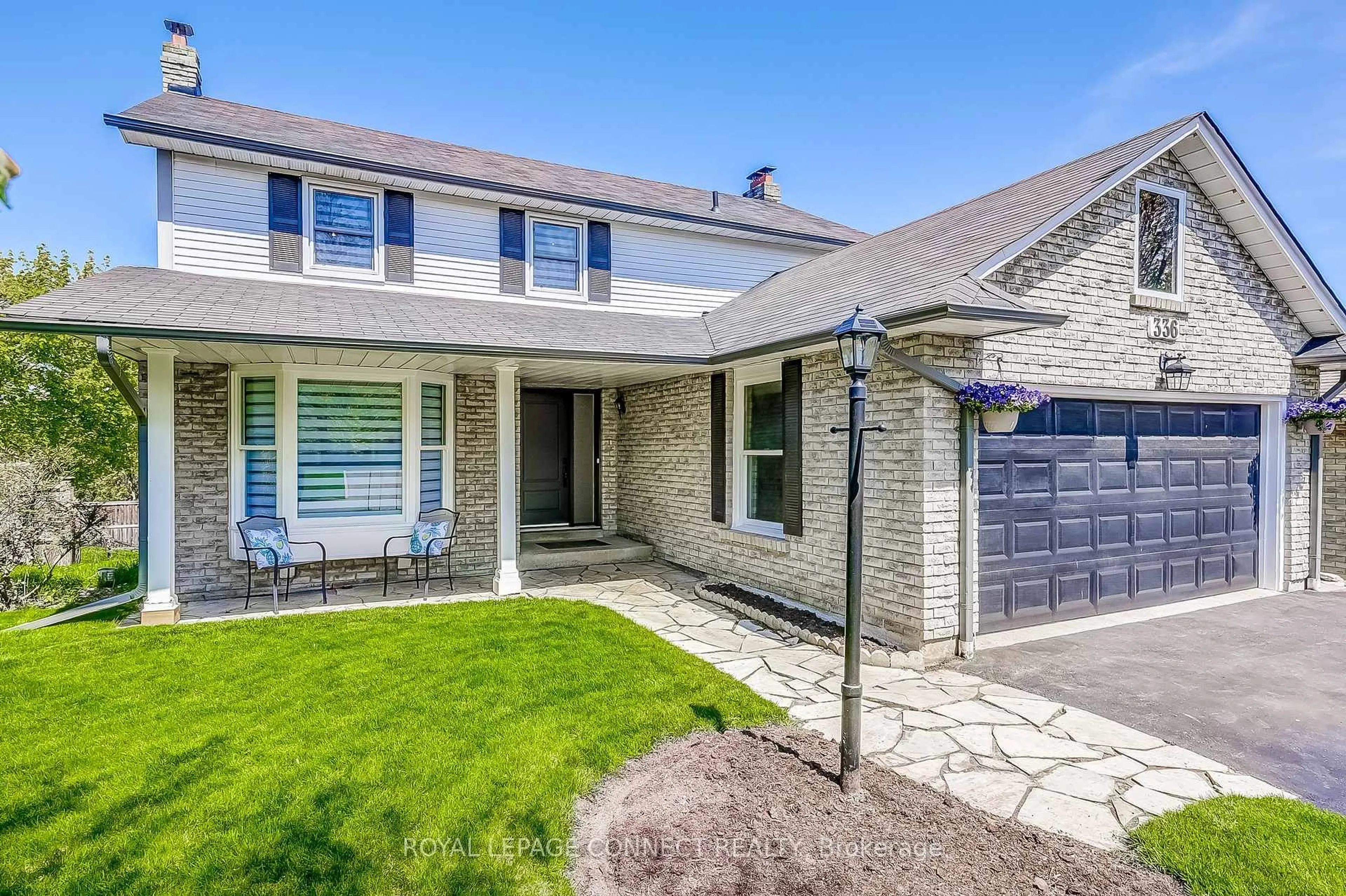 Home with brick exterior material, street for 336 Prince Of Wales Dr, Whitby Ontario L1N 6M9