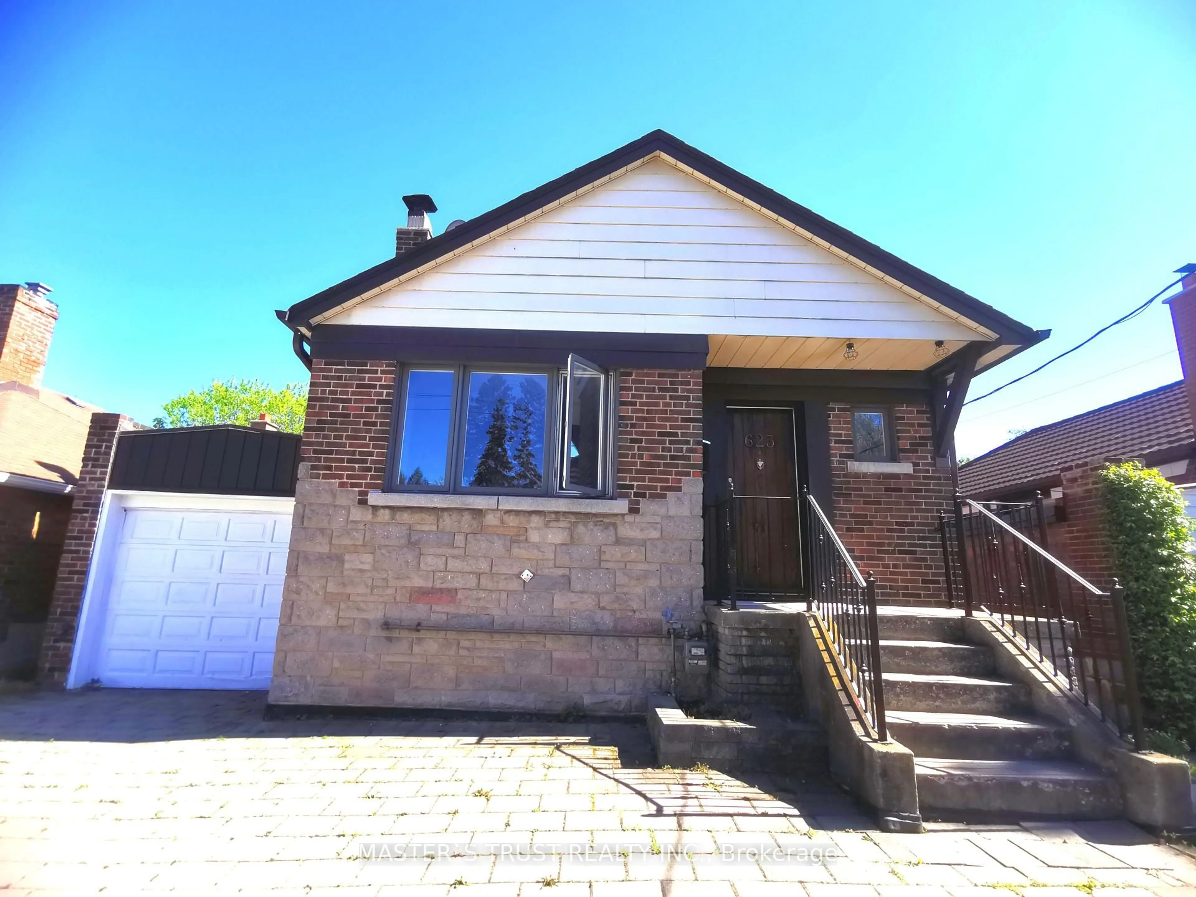 Home with brick exterior material, street for 623 O' Connor Dr, Toronto Ontario M4C 3A5