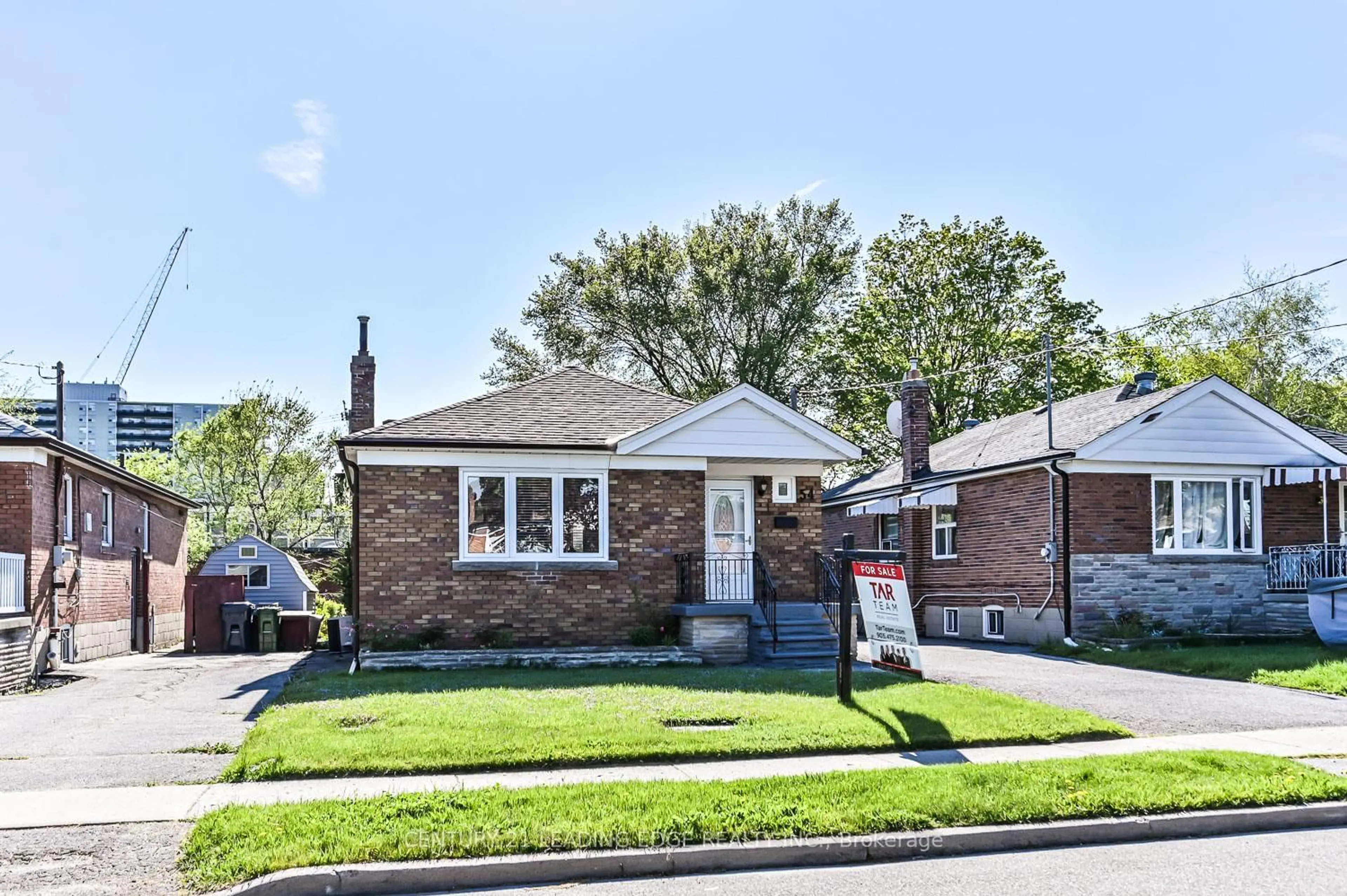 Home with brick exterior material, street for 54 Bimbrok Rd, Toronto Ontario M1K 4T9