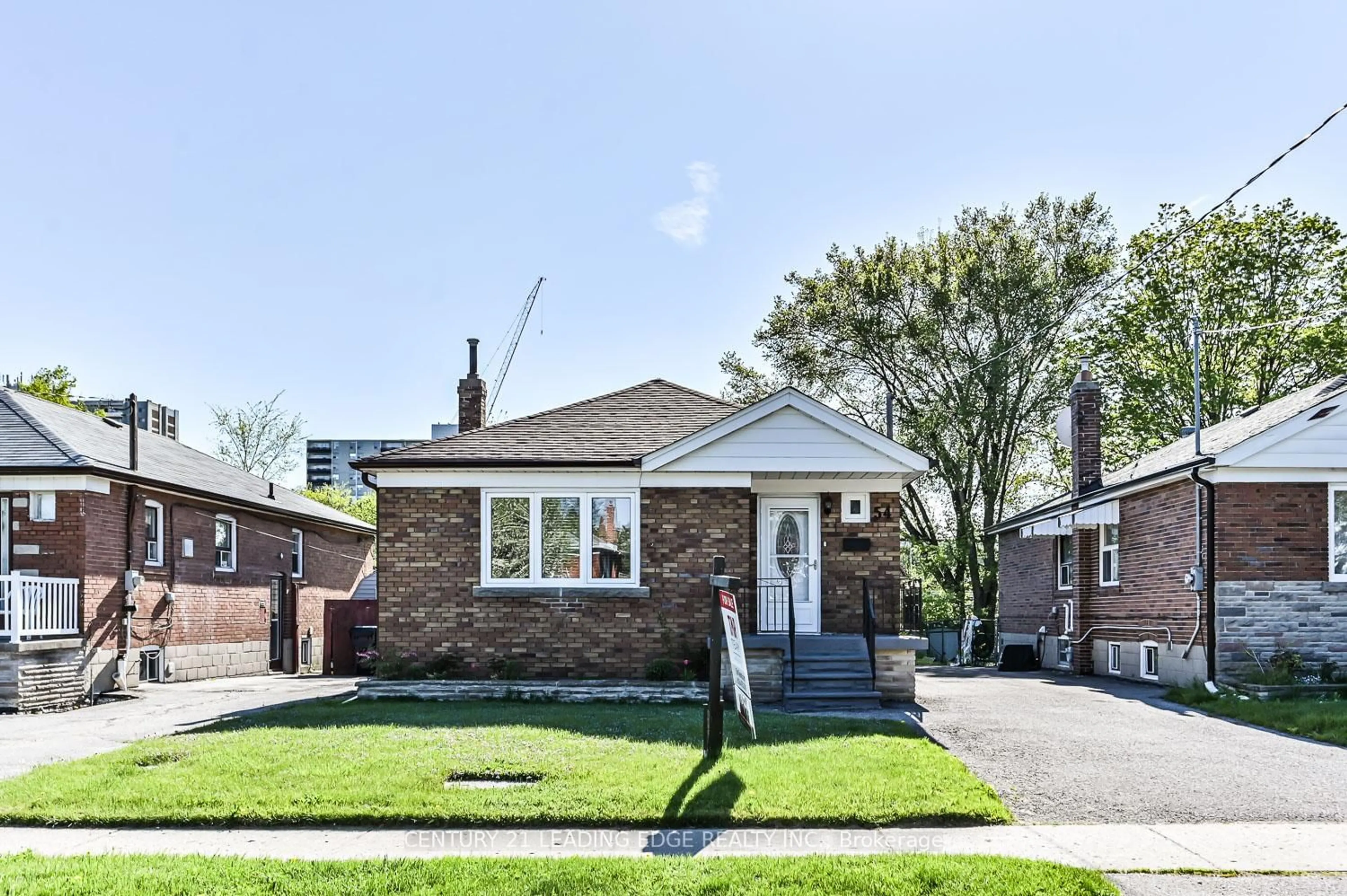Home with brick exterior material, street for 54 Bimbrok Rd, Toronto Ontario M1K 4T9