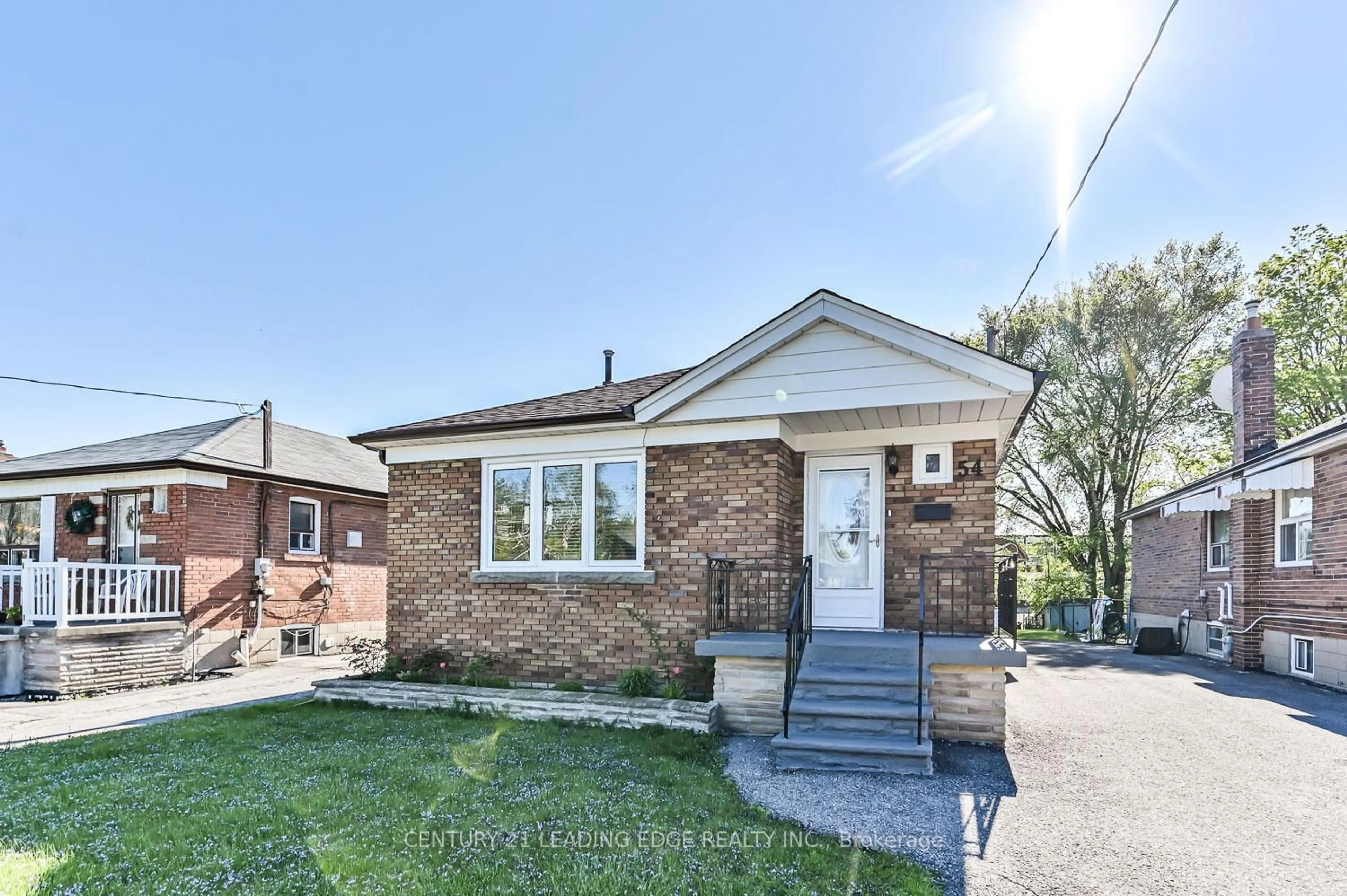 Home with brick exterior material, street for 54 Bimbrok Rd, Toronto Ontario M1K 4T9