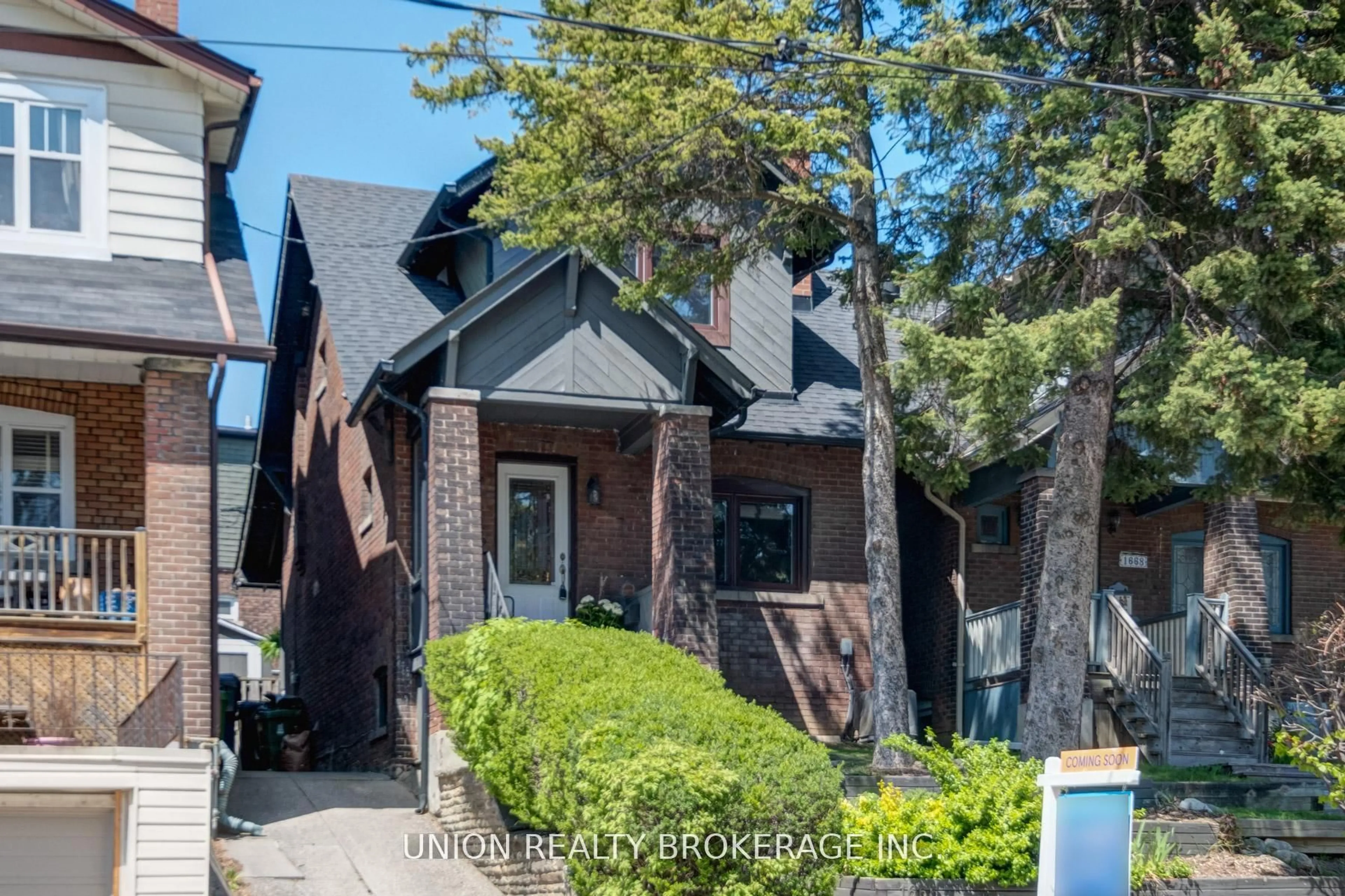 Home with brick exterior material, street for 1666 Gerrard St, Toronto Ontario M4L 2A8