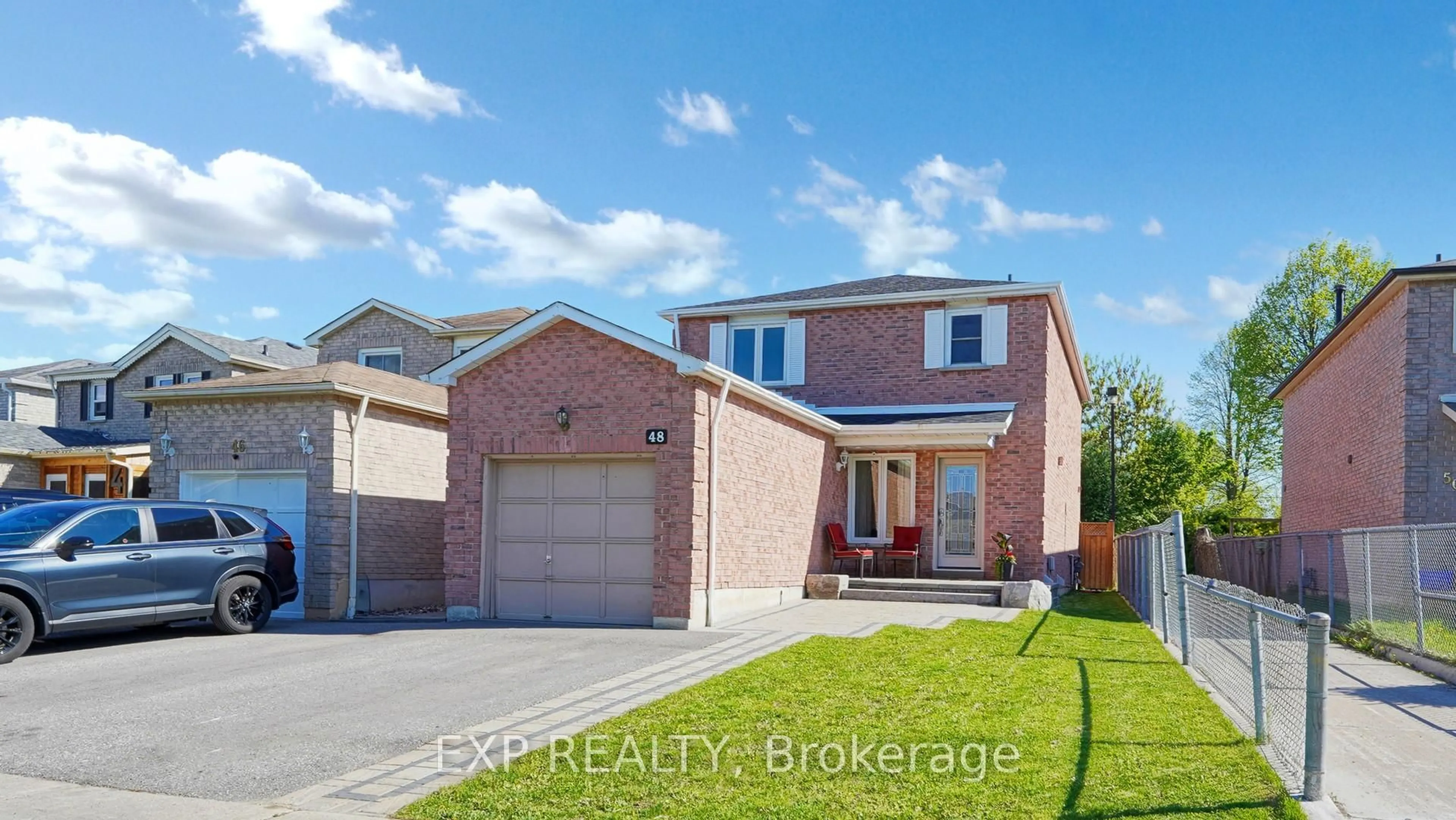 Home with brick exterior material, street for 48 Large Cres, Ajax Ontario L1T 2S9