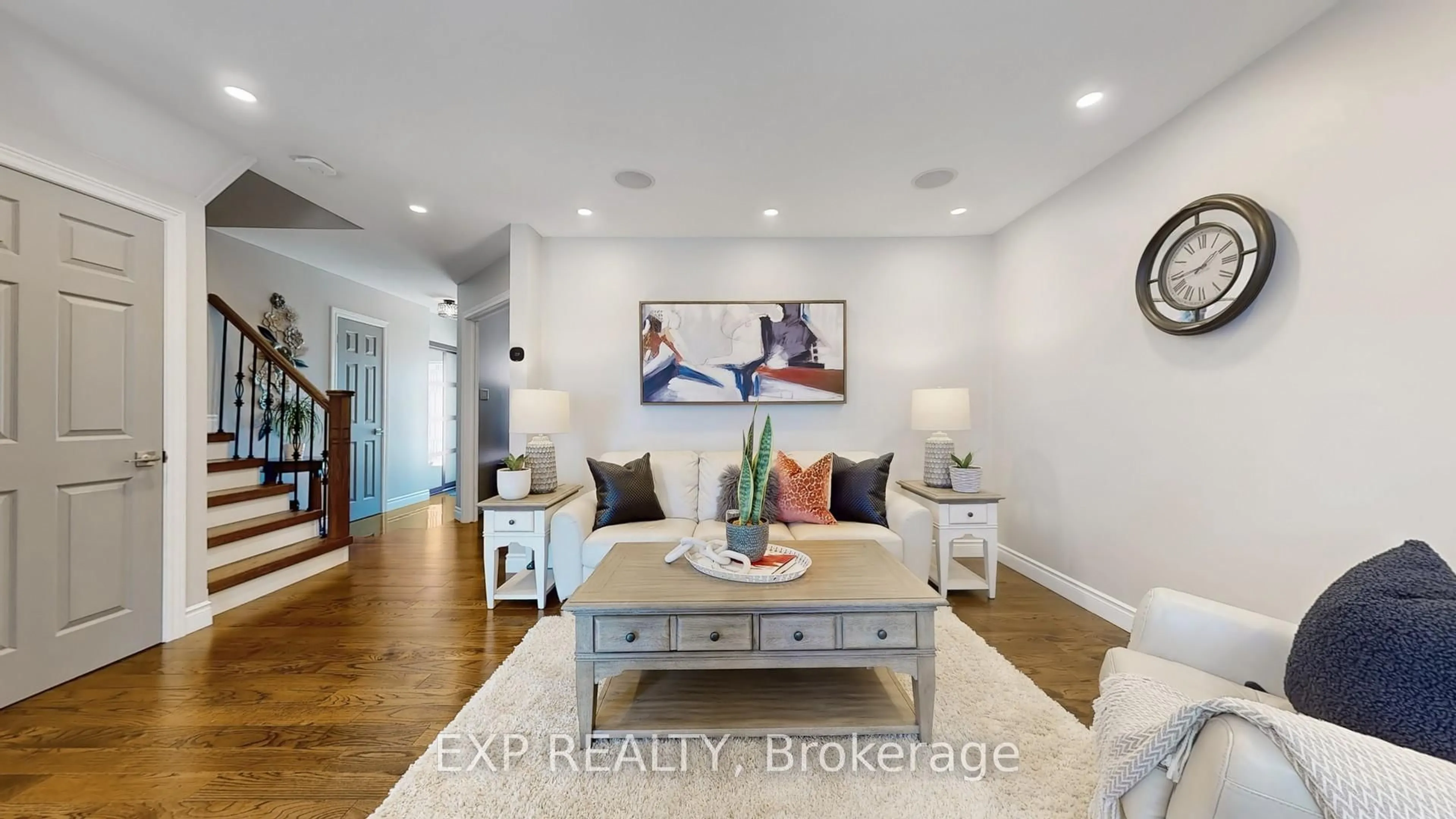 Living room with furniture, wood/laminate floor for 48 Large Cres, Ajax Ontario L1T 2S9